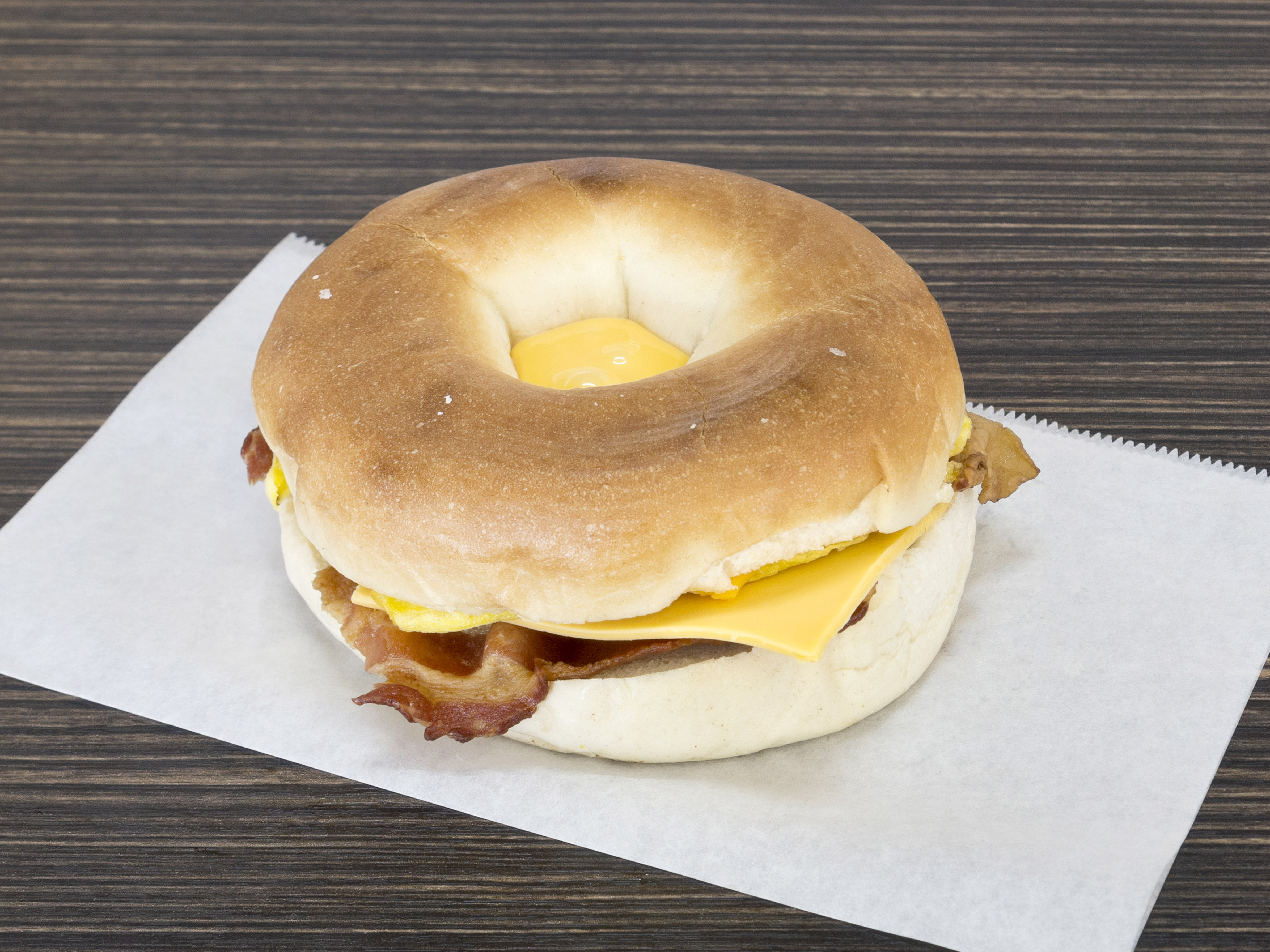 Order Bacon, Egg and Cheese Bagel food online from Red Oak Donuts store, Red Oak on bringmethat.com