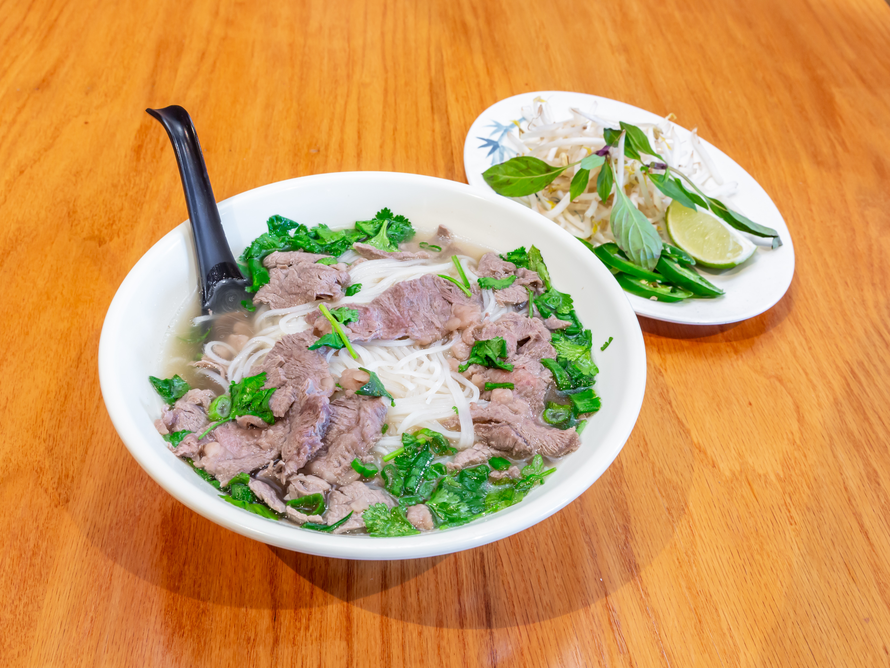 Order Beef Pho Noodle Soup food online from W’Lins Asian Cuisine &Spirits store, Spring Hill on bringmethat.com