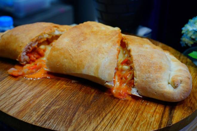 Order 4 topping Calzone food online from Pizza Fino store, Katy on bringmethat.com