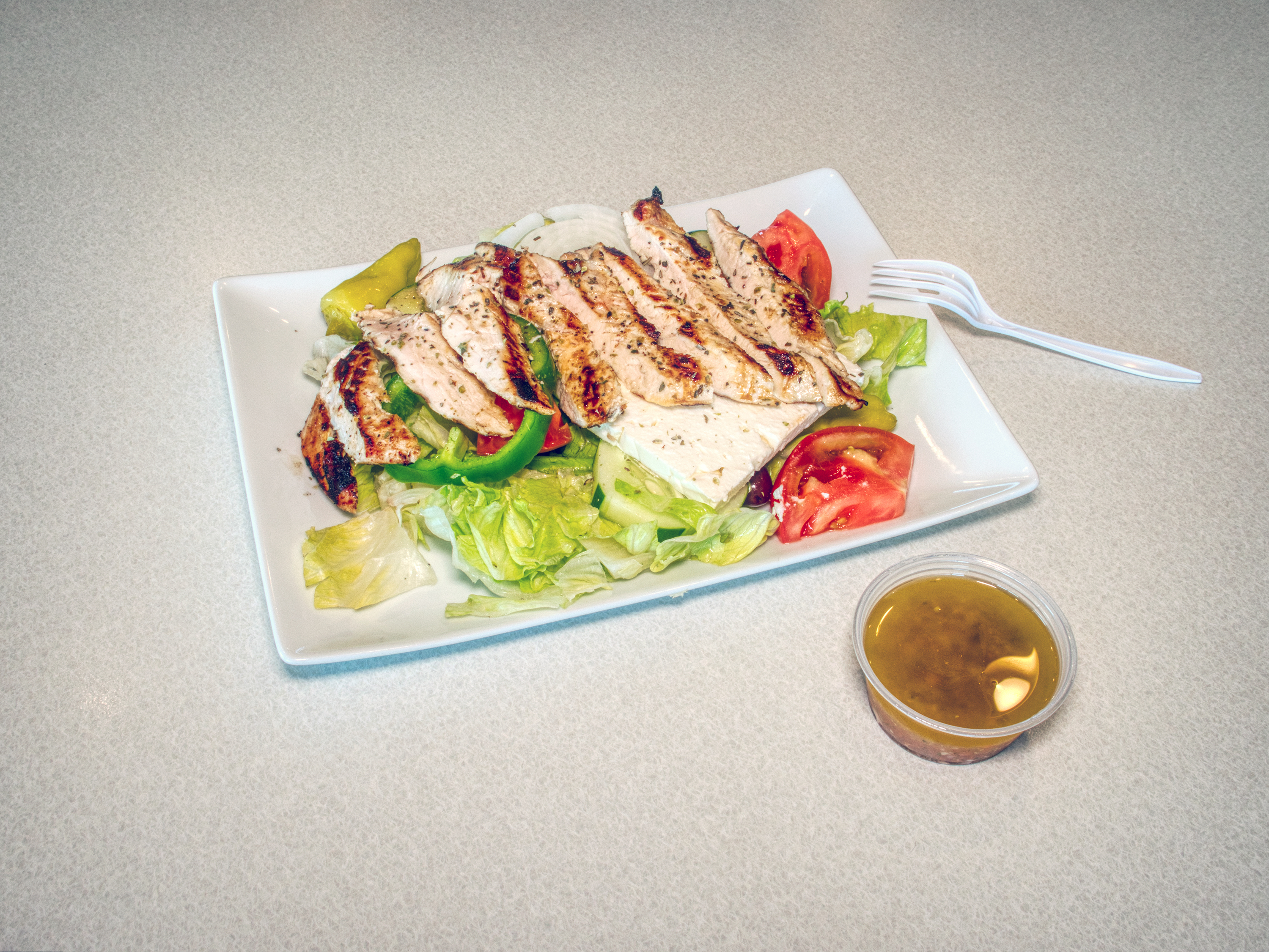 Order Chicken Caesar Salad food online from Nikkos Grecian Grill store, Mundelein on bringmethat.com