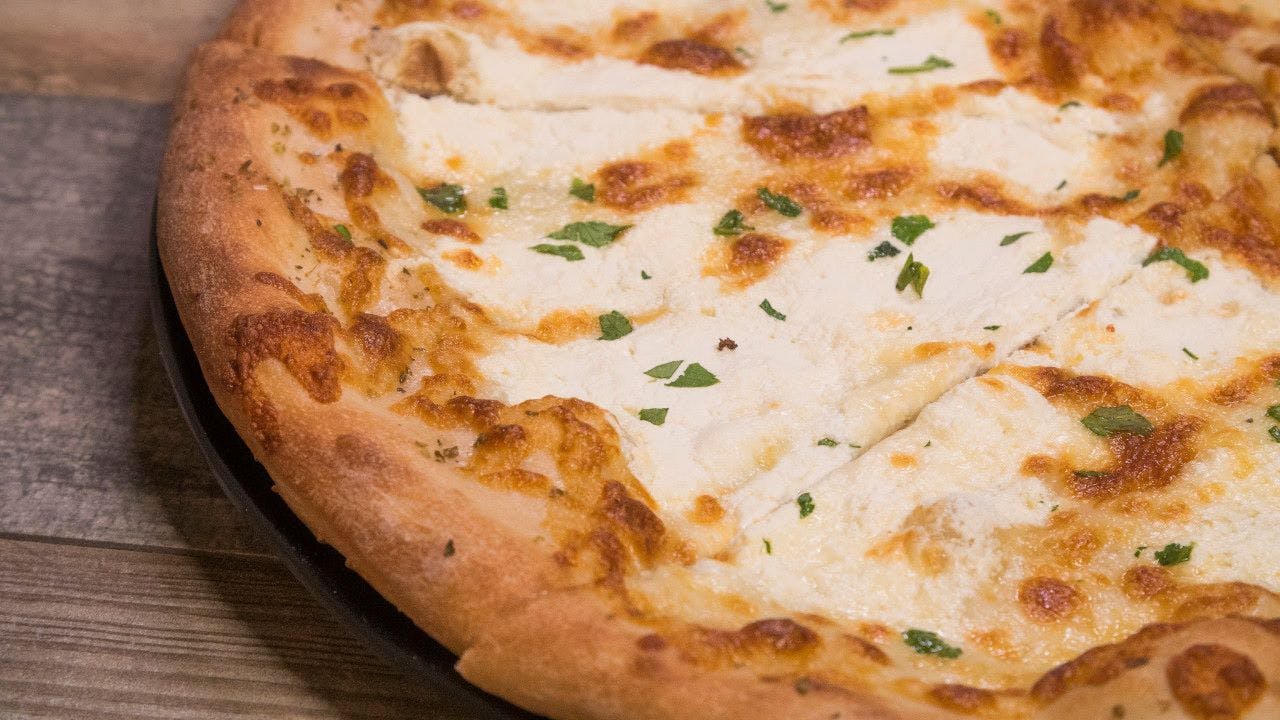 Order White Pizza - Medium 12'' food online from Arlon's Carry Out store, Baltimore on bringmethat.com