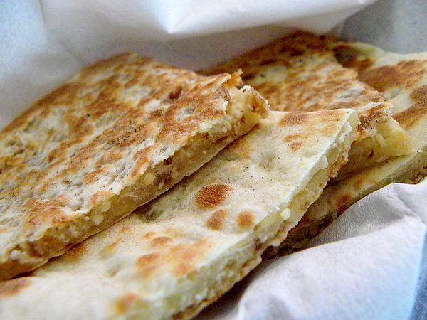 Order Peshwari Naan food online from India's Grill store, Los Angeles on bringmethat.com