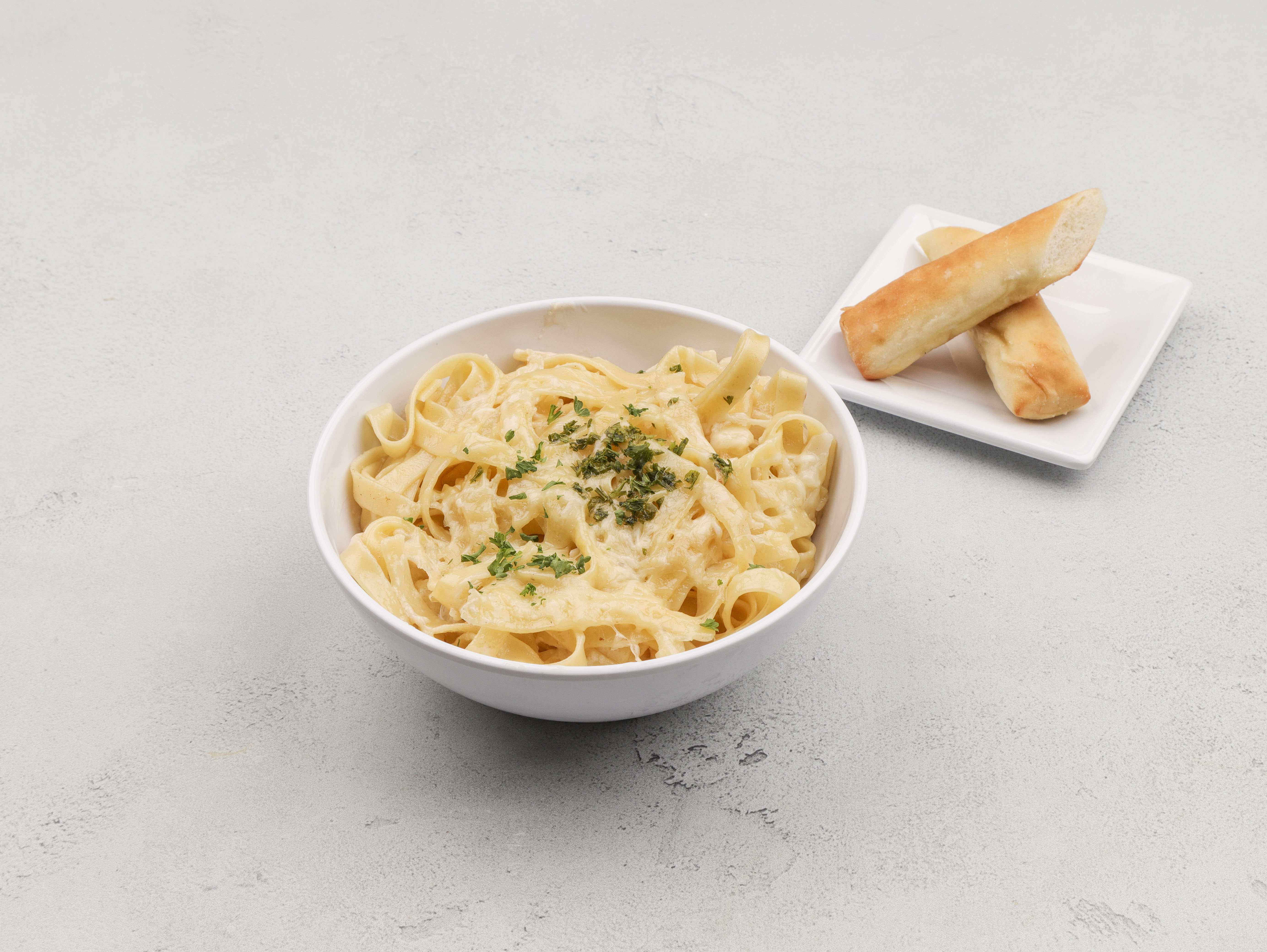 Order Fettuccini Alfredo food online from Nothing But Noodles store, Huntsville on bringmethat.com