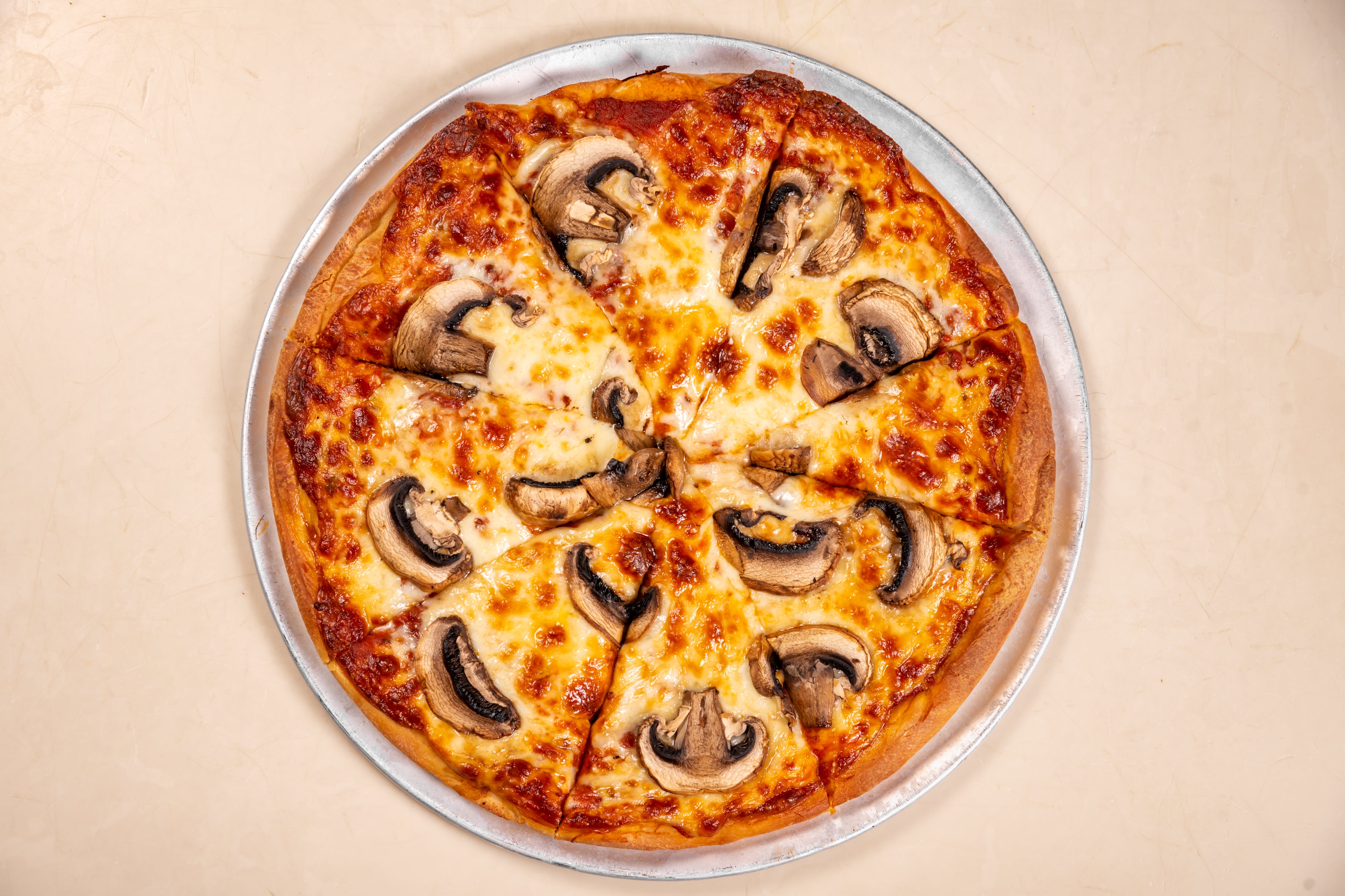 Order Mushroom Pizza - 12" food online from Omonia Cafe store, Astoria on bringmethat.com