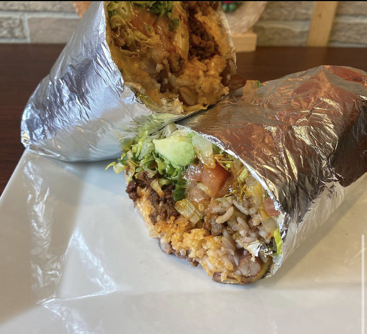 Order Burritos food online from Uncle's Pizza store, Norwalk on bringmethat.com