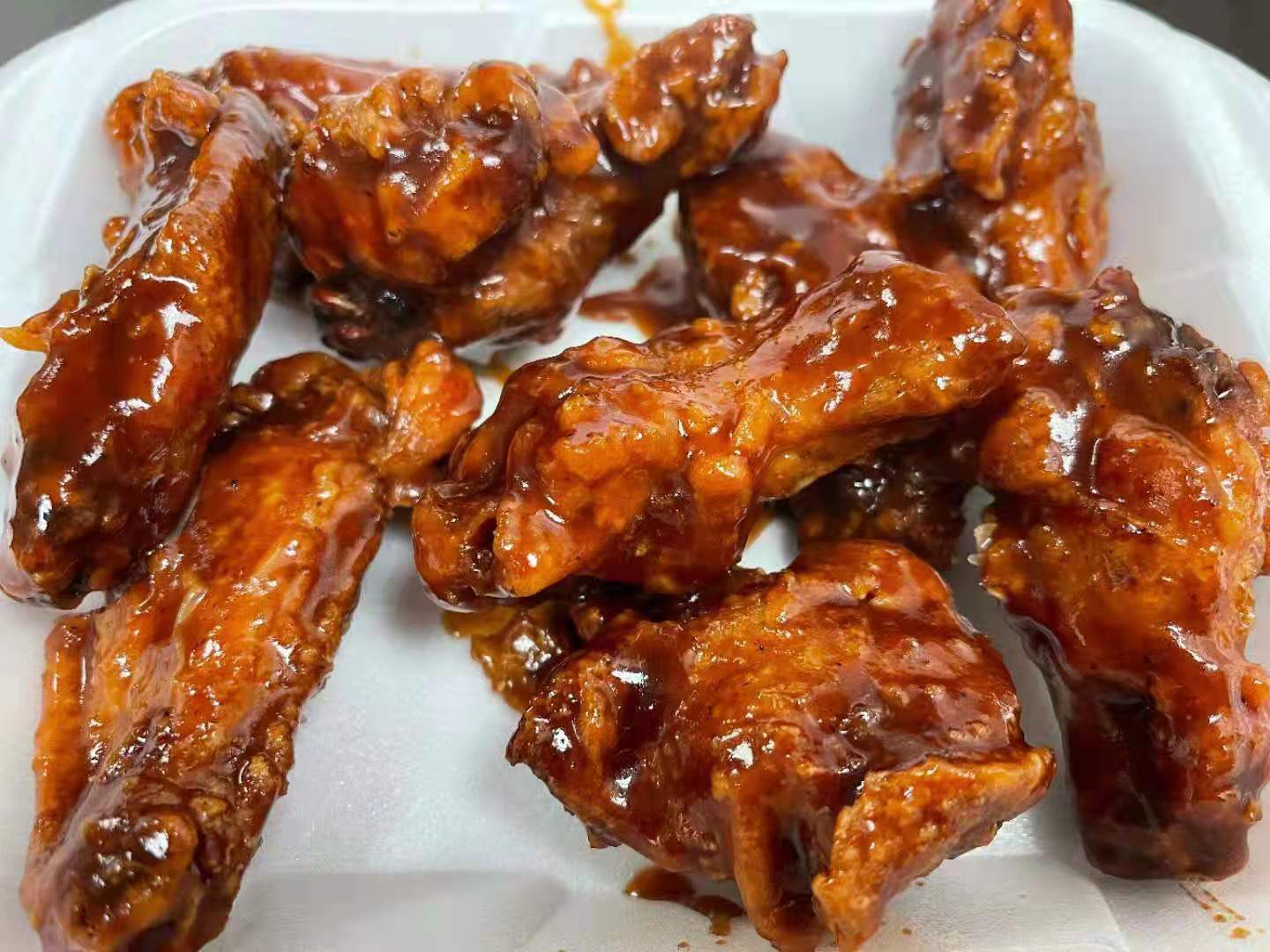 Order A12. BBQ Wings food online from Sam Cafe store, Houston on bringmethat.com