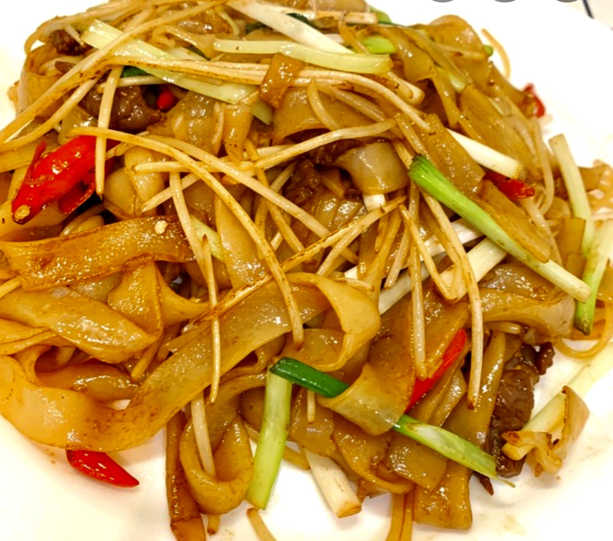 Order Drunken Noodles food online from Tra Ling Oriental Cafe store, Boulder on bringmethat.com