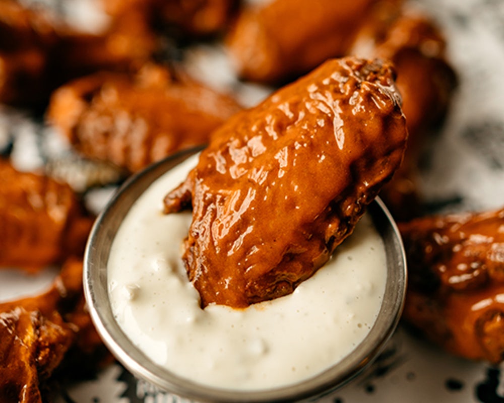Order Wings 20 food online from Willie's Grill & Icehouse store, Houston on bringmethat.com