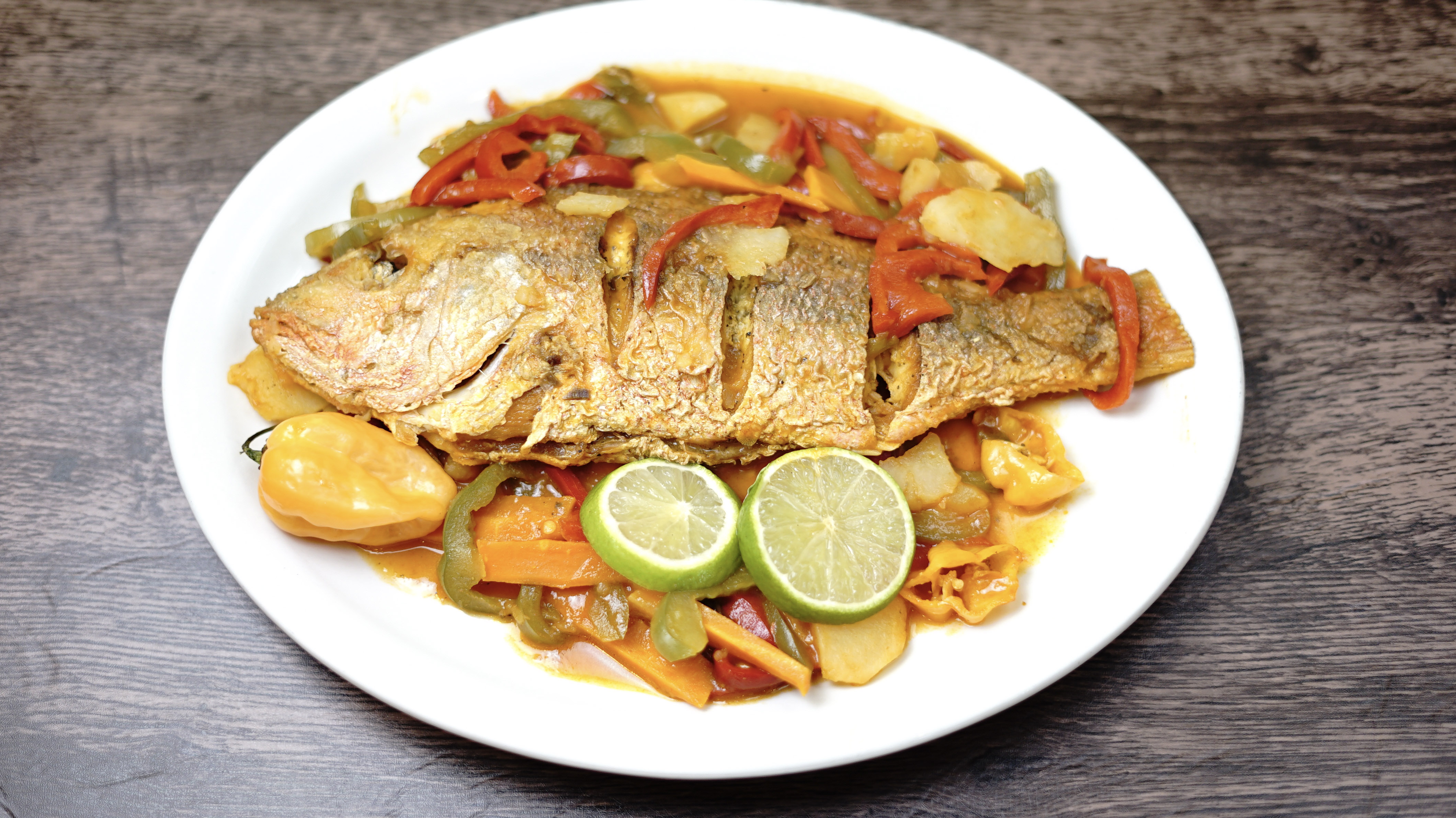 Order Brown Stew Fish Dinner food online from Yaad Style Jamaican Cuisine store, Portland on bringmethat.com