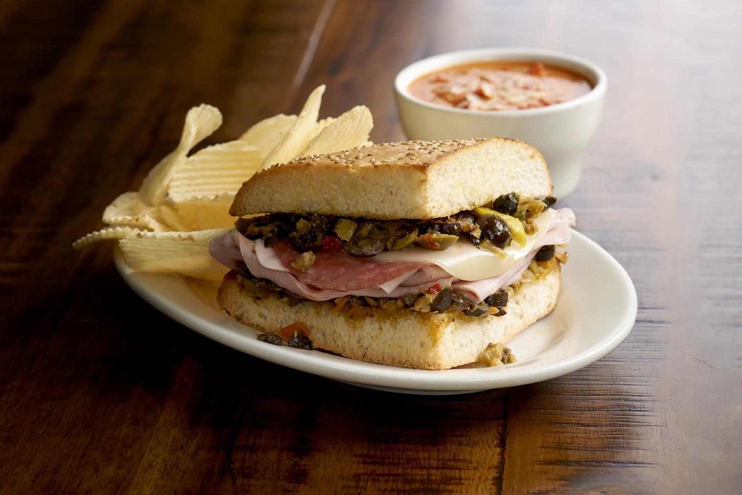 Order 1/4 Muffaletta Special food online from Jason's Deli store, Brownsville on bringmethat.com