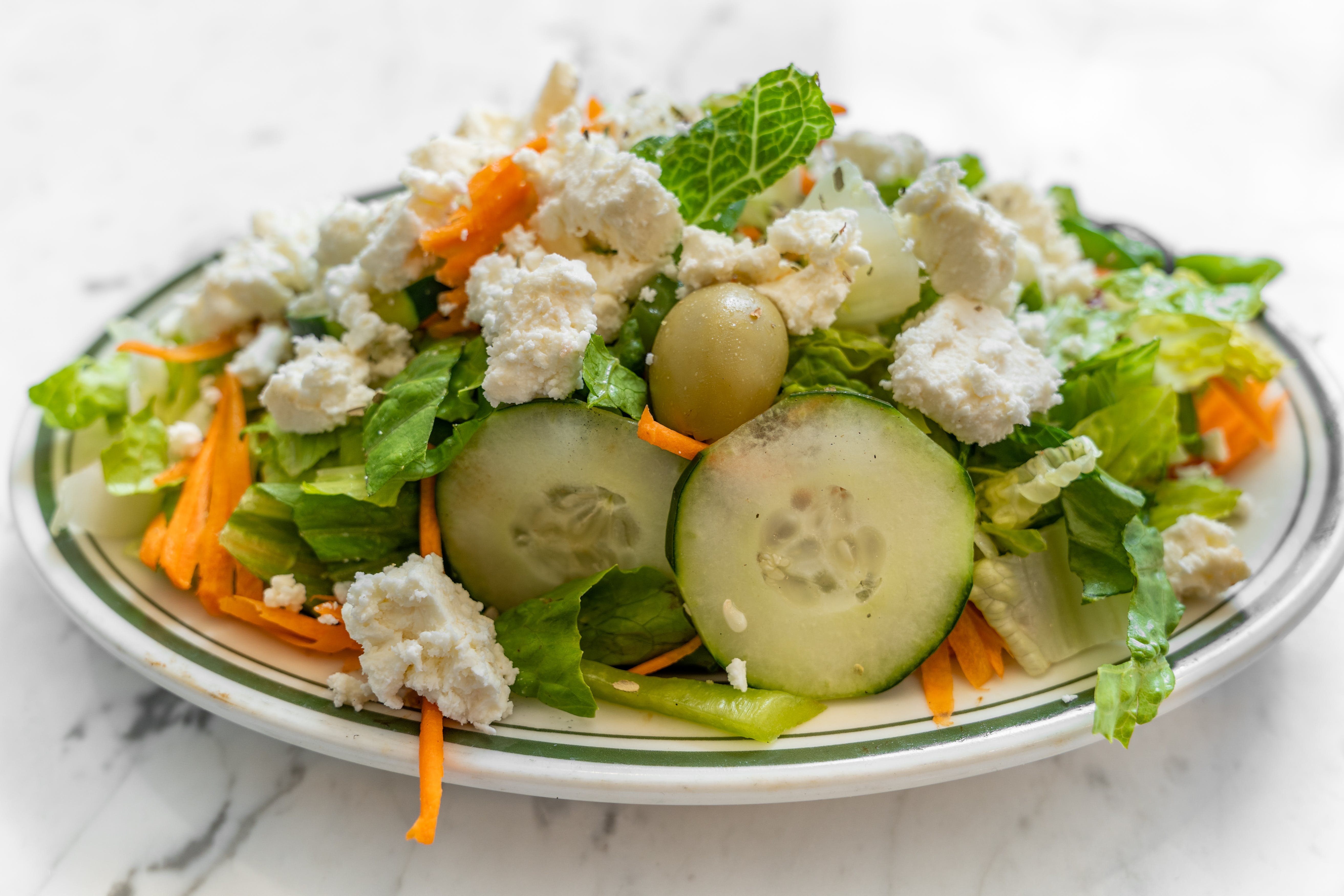 Order Greek Salad - Salad food online from Roma's pizza store, New York on bringmethat.com