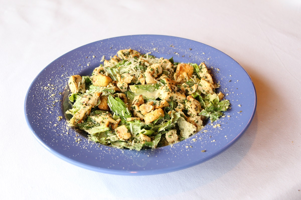 Order Chicken Caesar Salad food online from Palio Pizza Cafe store, Fort Worth on bringmethat.com