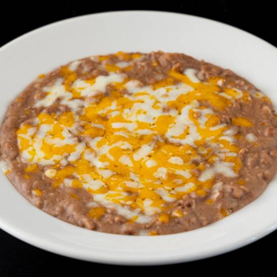 Order Refried Beans food online from El Gringo Mexican Restaurant store, Hermosa Beach on bringmethat.com