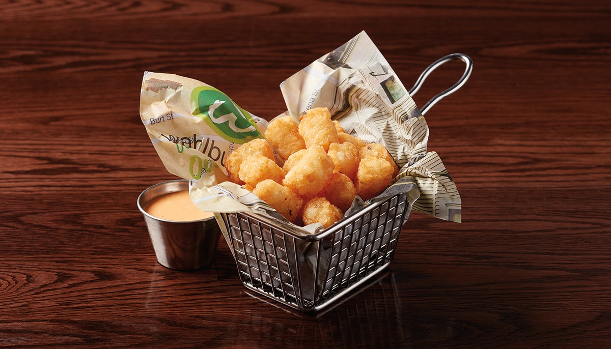 Order Side Tator Tots food online from Wahlburgers store, Olathe on bringmethat.com