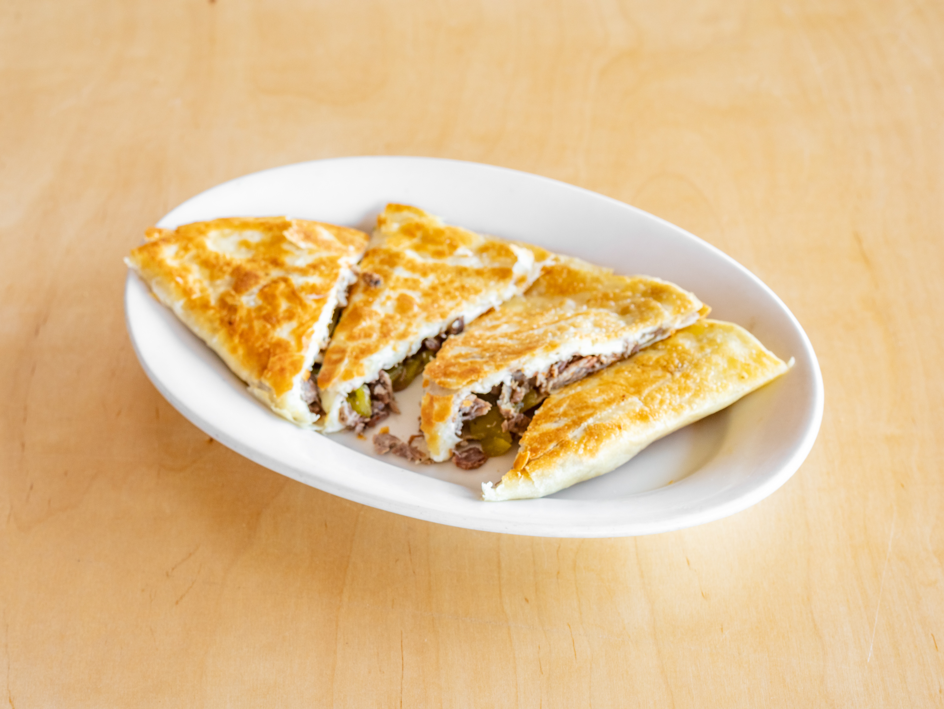 Order Lutes Quesadilla’s with Our Tender Tri Tip Beef food online from Lutes' Casino store, Yuma on bringmethat.com