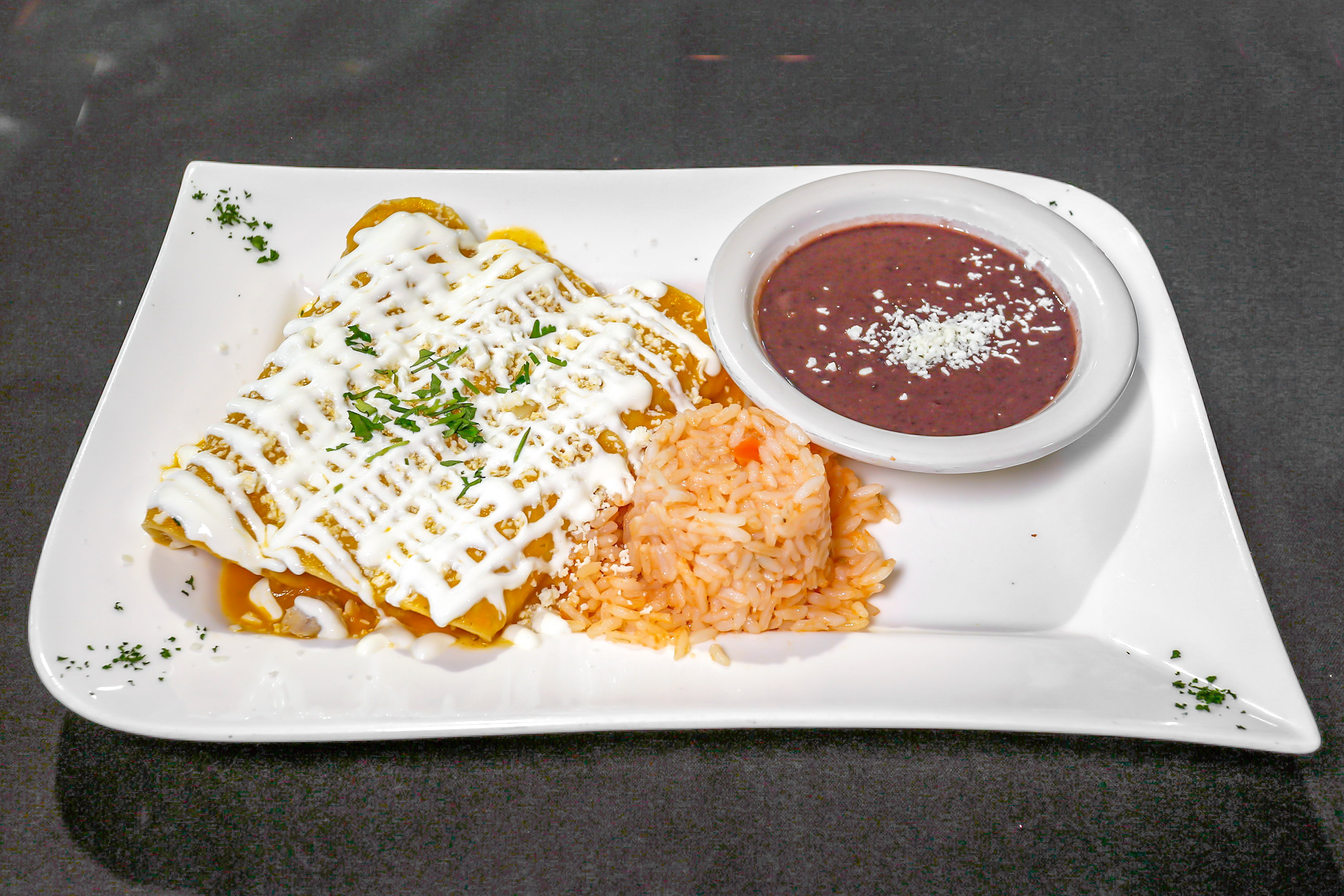 Order Chicken Enchiladas - 3 Pieces food online from Limeport Deli & Cafe store, Coopersburg on bringmethat.com