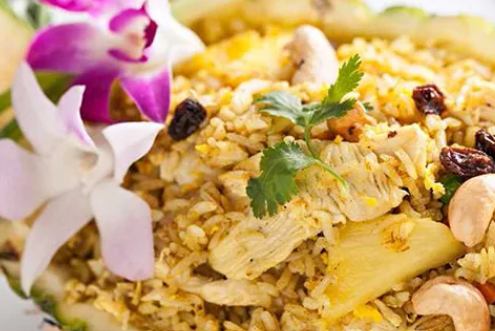 Order Pineapple Fried Rice food online from Fire Tiger Thai Food store, Whittier on bringmethat.com