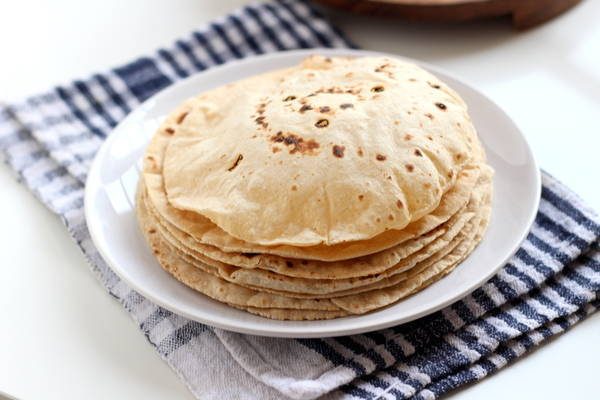 Order Tava Roti food online from Baisakhi Dhaba store, Voorhees Township on bringmethat.com