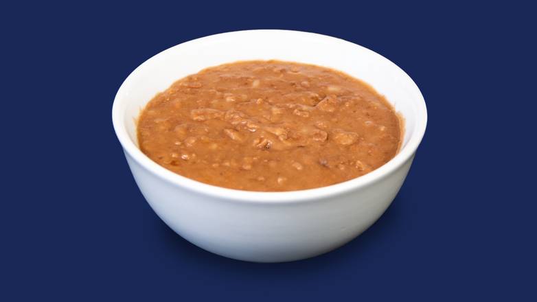 Order Refried Beans Regular food online from Taco Palenque store, Helotes on bringmethat.com