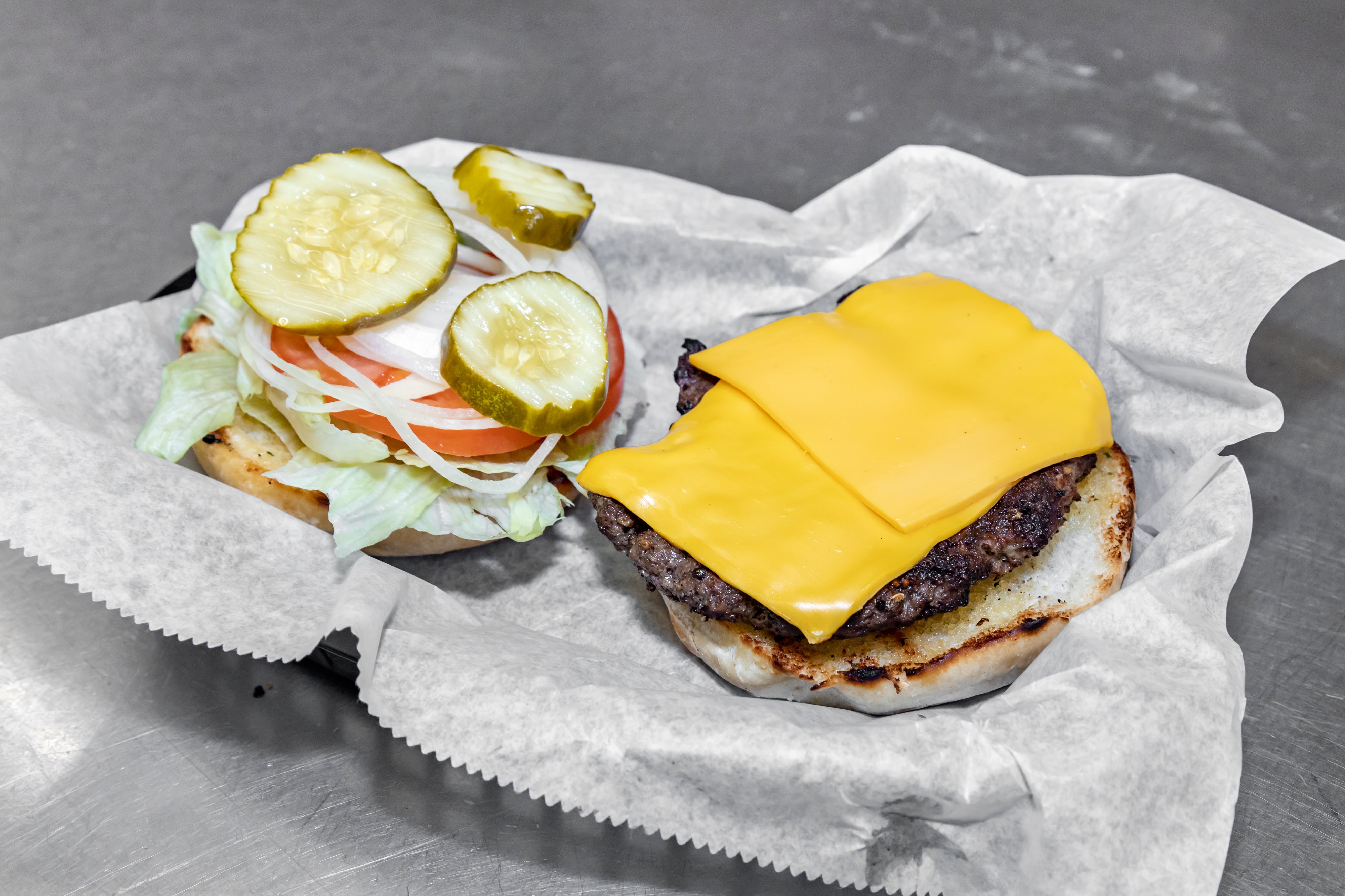Order Cheeseburger - 1/2 lb. food online from Luconi's Pizza store, Bradley on bringmethat.com