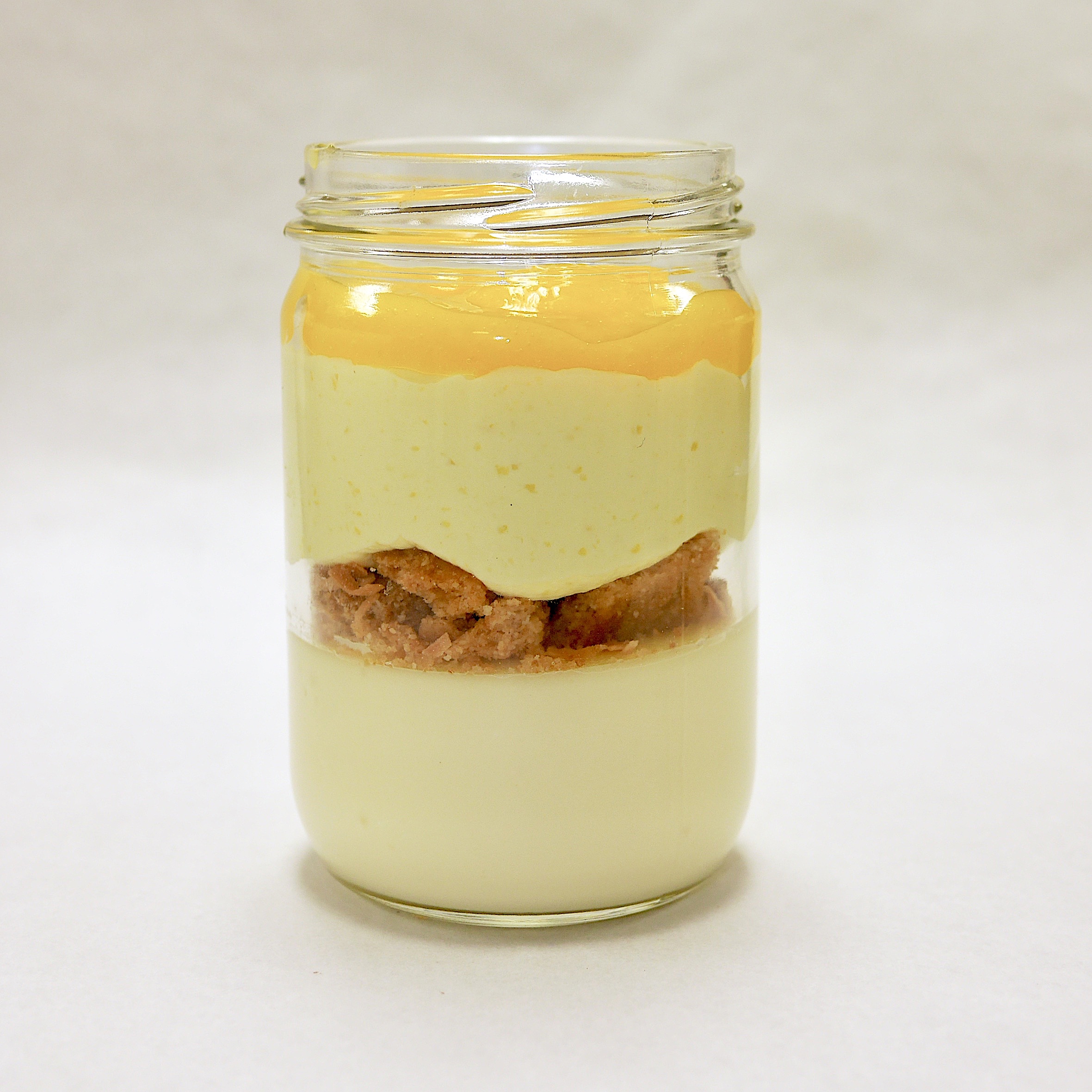 Order Tropical Mango Cheesecake In a Jar food online from Crumb store, Plainfield on bringmethat.com