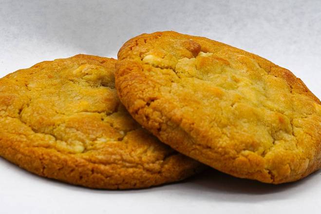 Order Macadamia Nut White Chocolate chip Cookie  food online from Sloan store, West Palm Beach on bringmethat.com