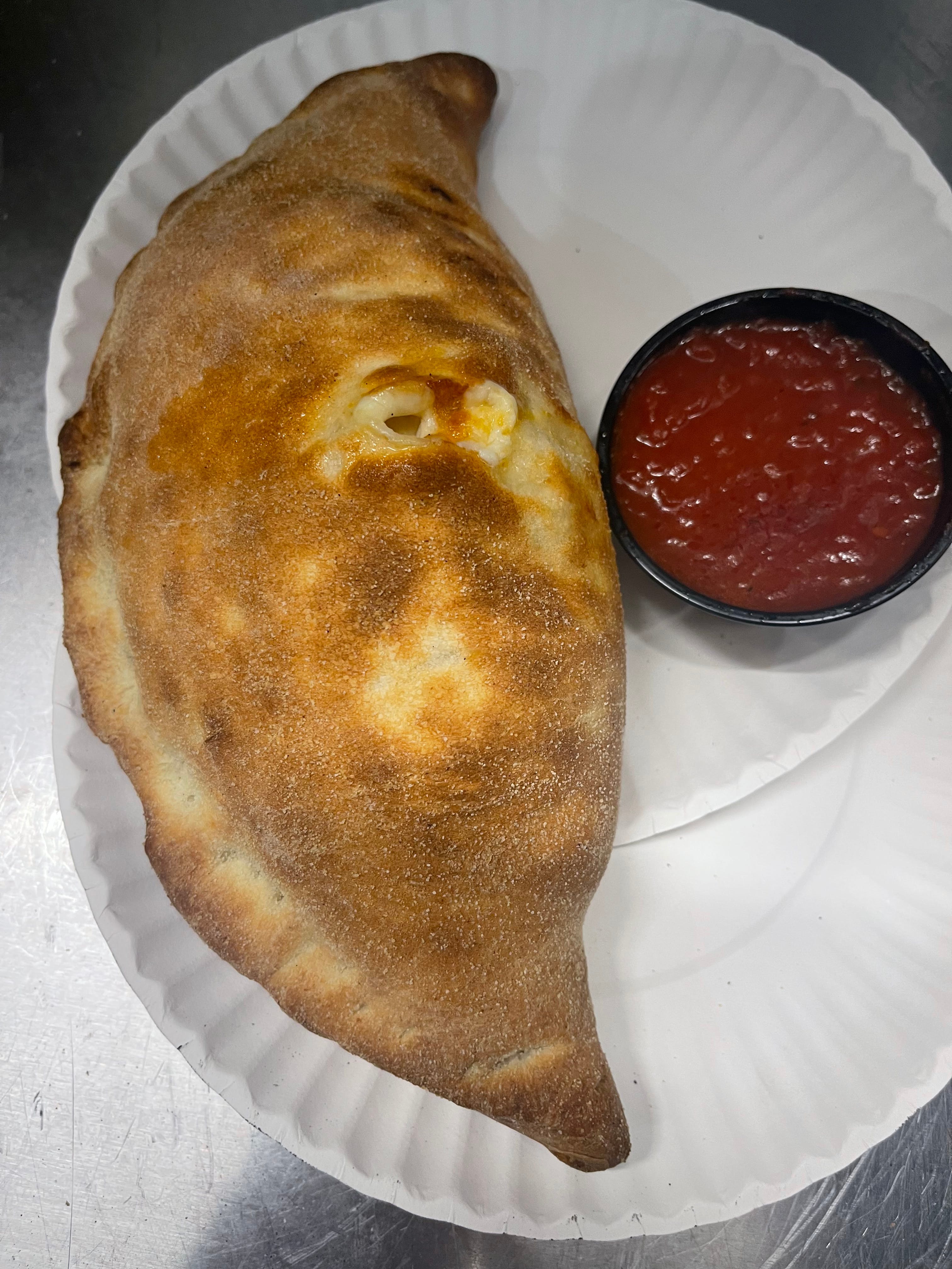 Order Cheese Calzone - Calzone food online from Biby's Empanadas & Pizza store, Fair Lawn on bringmethat.com