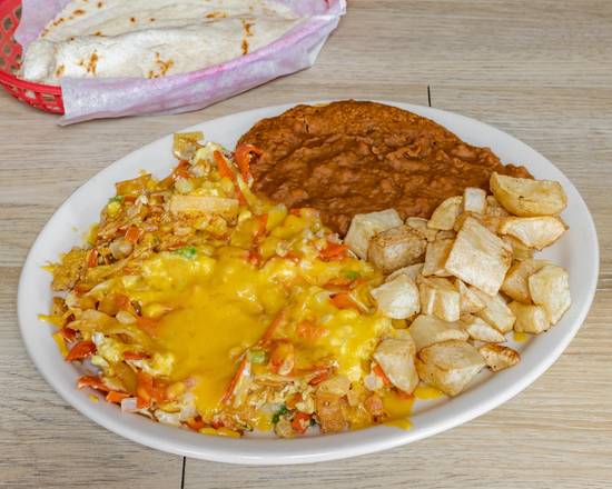 Order Chilaquiles a La Mexicana Plate food online from Eddie's Taco House store, San Antonio on bringmethat.com