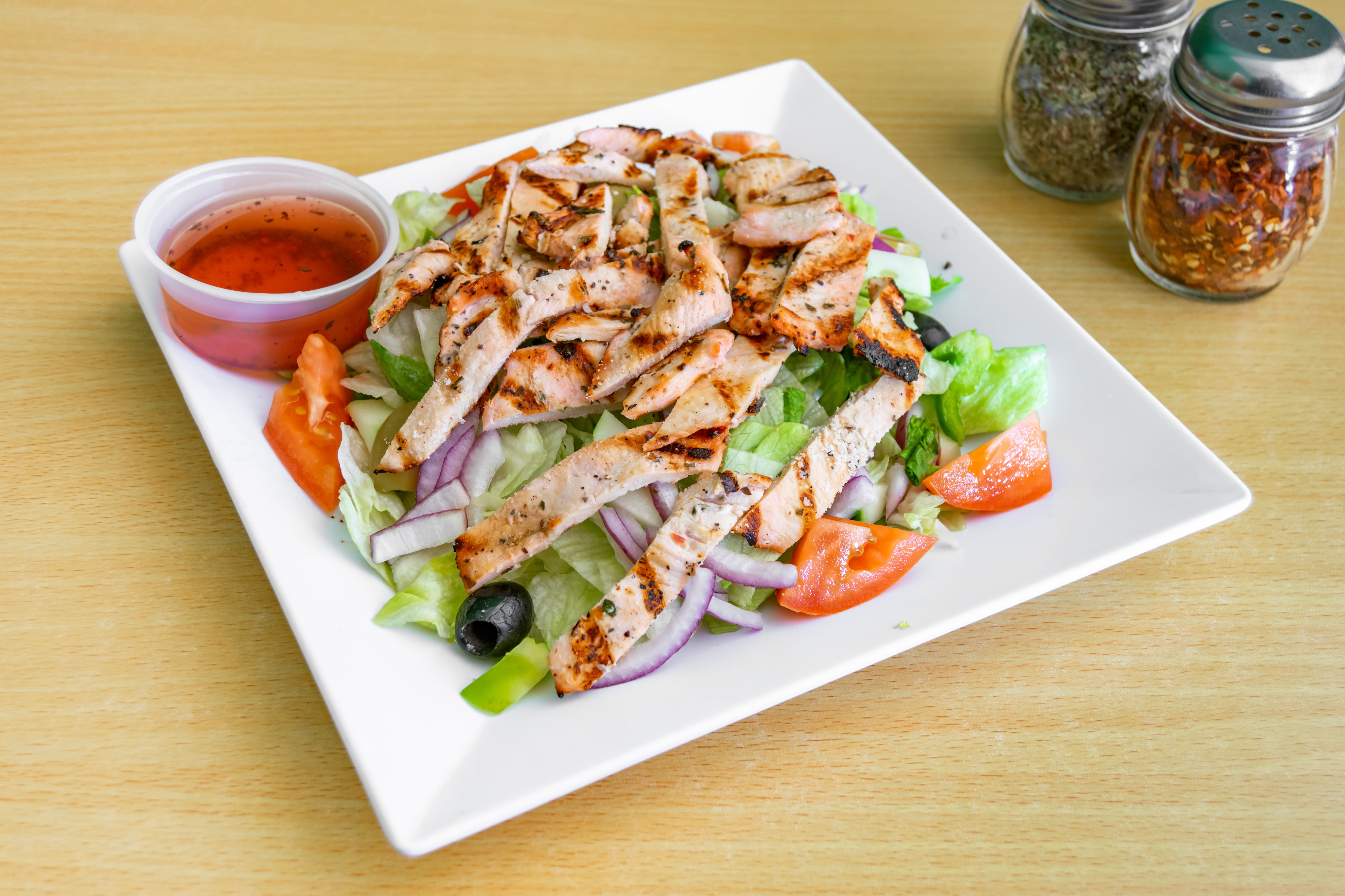 Order Dolce Special Salad - Salad food online from Dolce Pizza store, East Orange on bringmethat.com