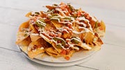 Order Nachos Deluxe food online from Hickory Tavern store, Charlotte on bringmethat.com