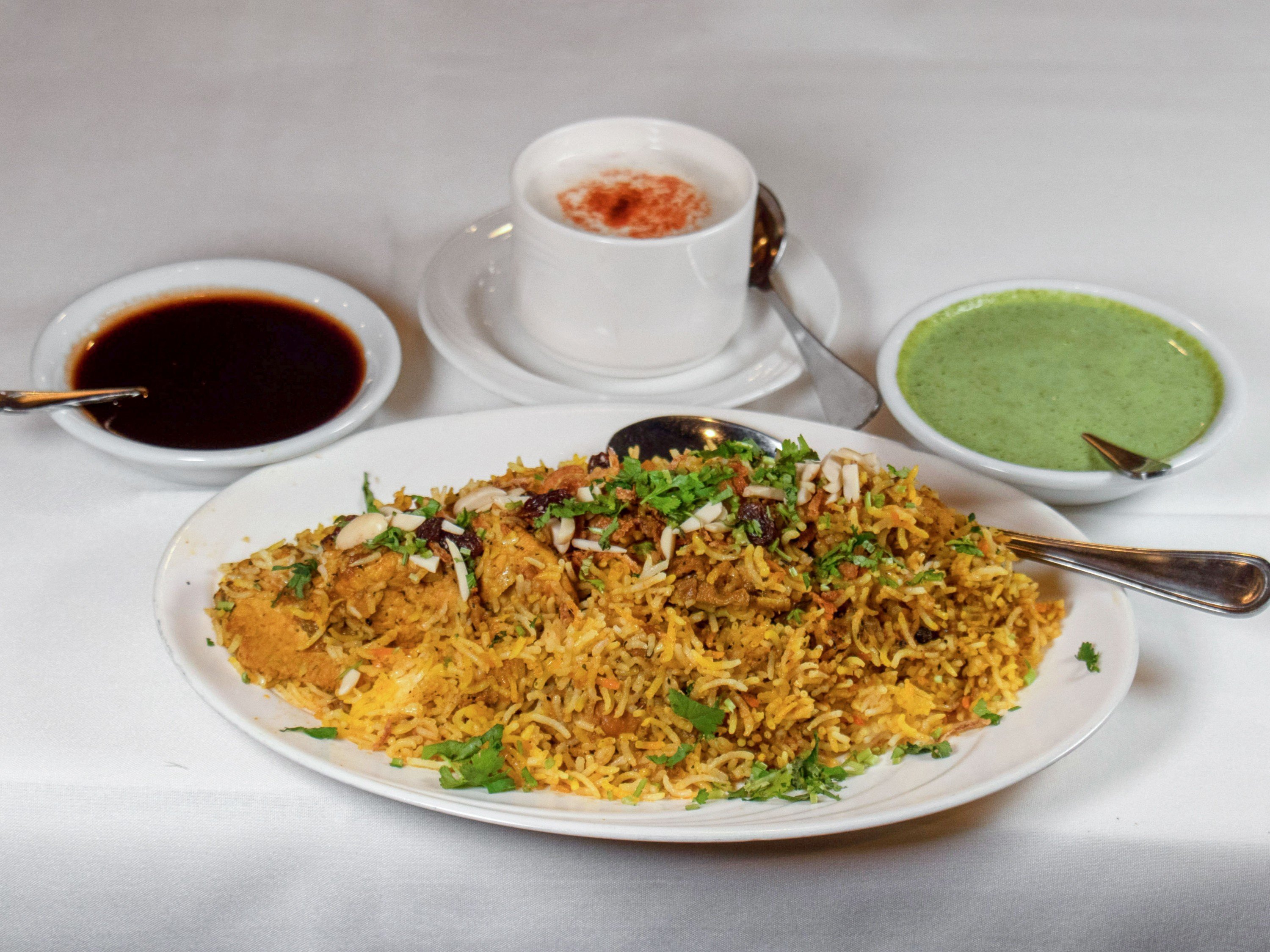 Order 2. Murgh Biryani food online from Rajaji Fine Indian Cuisine store, Washington on bringmethat.com