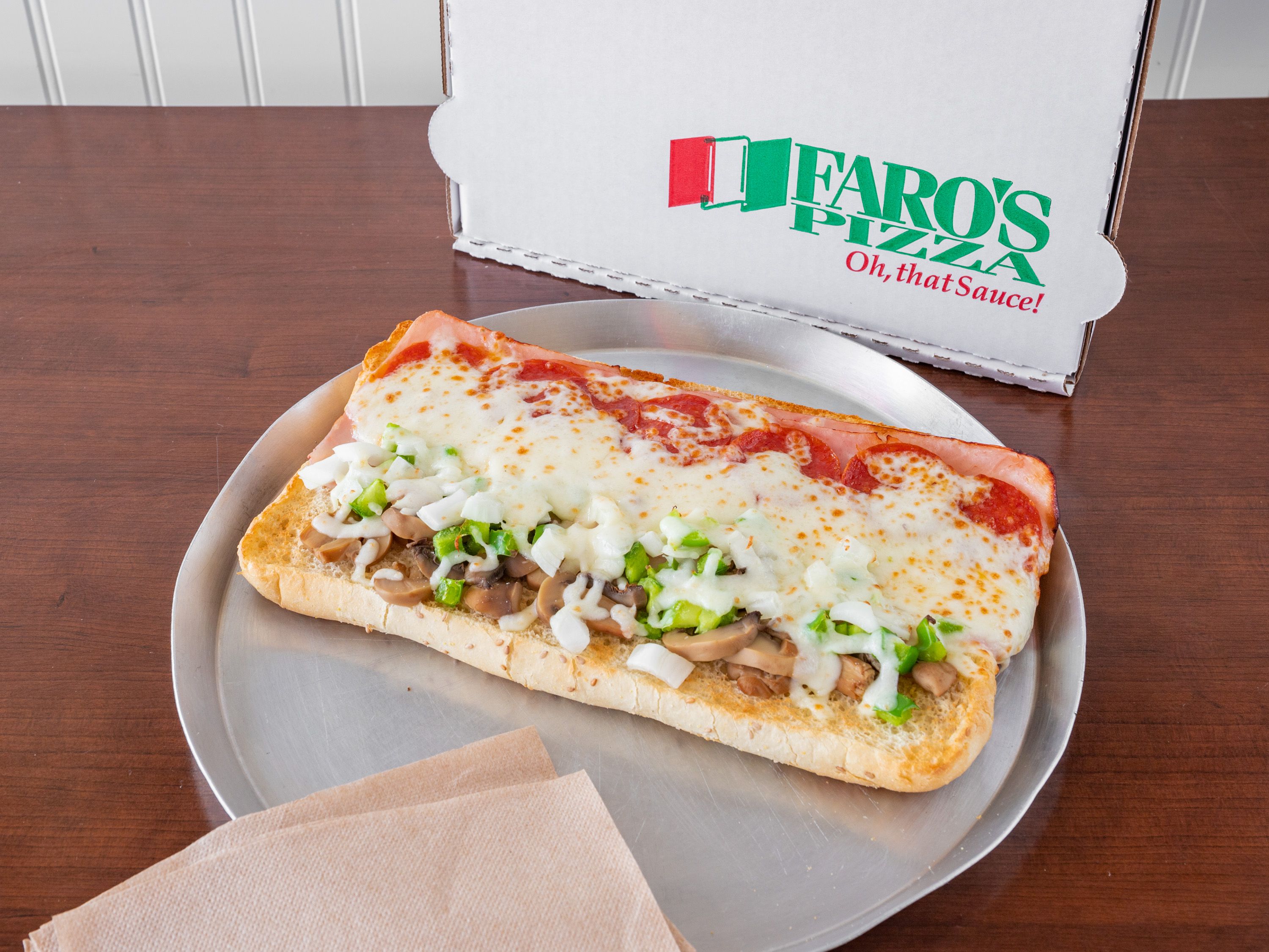Order Deluxe Sub 10" food online from Faro's Italian Pizza store, Grand Rapids on bringmethat.com