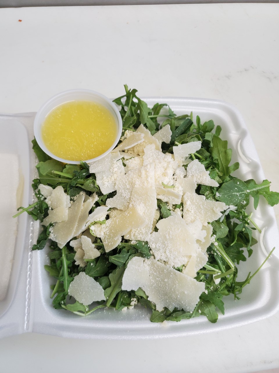 Order Arugula Salad food online from Pizzeria Pesto store, Philadelphia on bringmethat.com