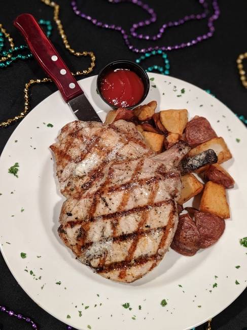 Order Pork Chop food online from Louisiana Bistreaux Seafood Kitchen store, East Point on bringmethat.com