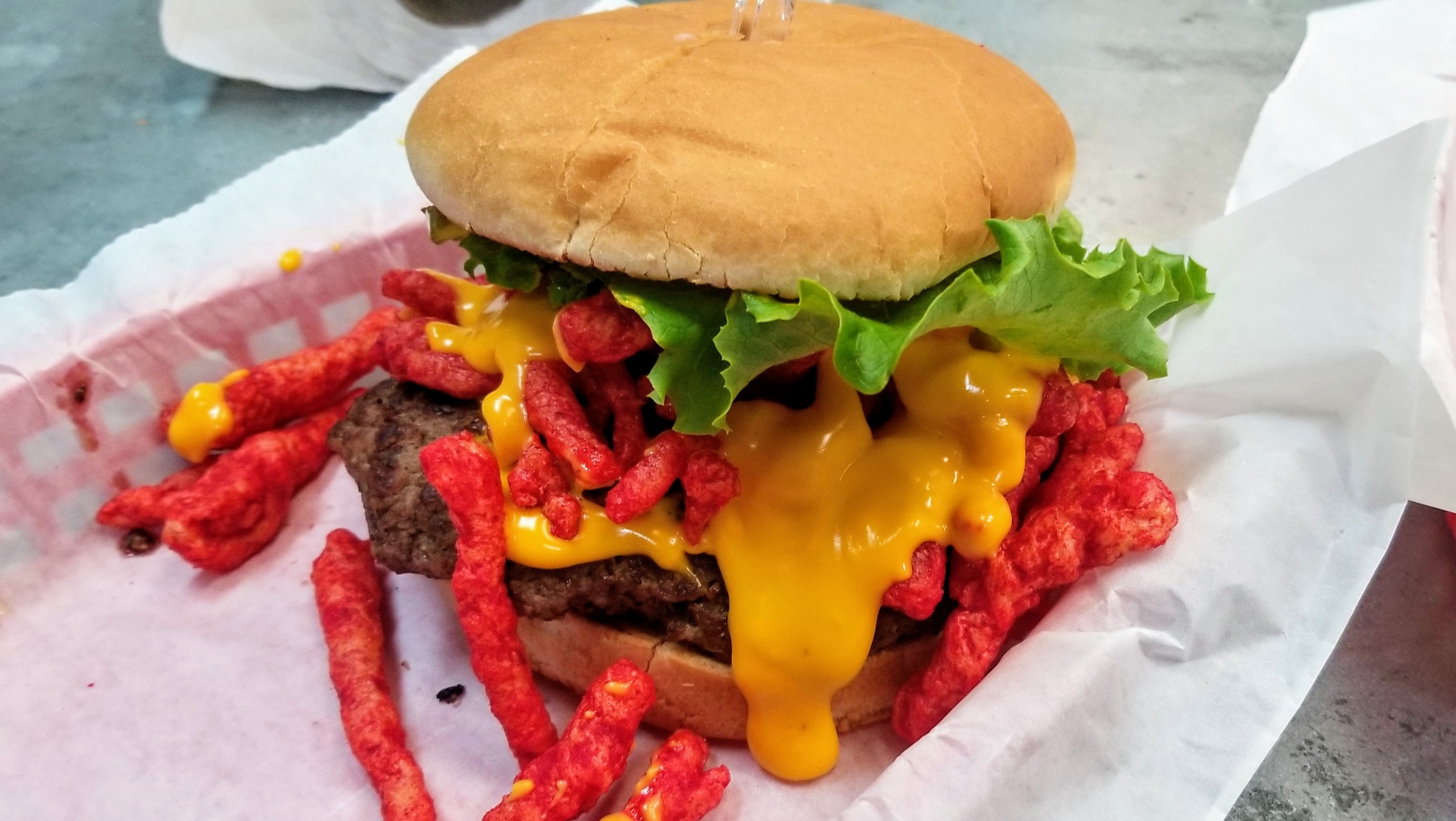 Order Hot Cheeto Burger food online from Burgers Near Me store, Huffman on bringmethat.com