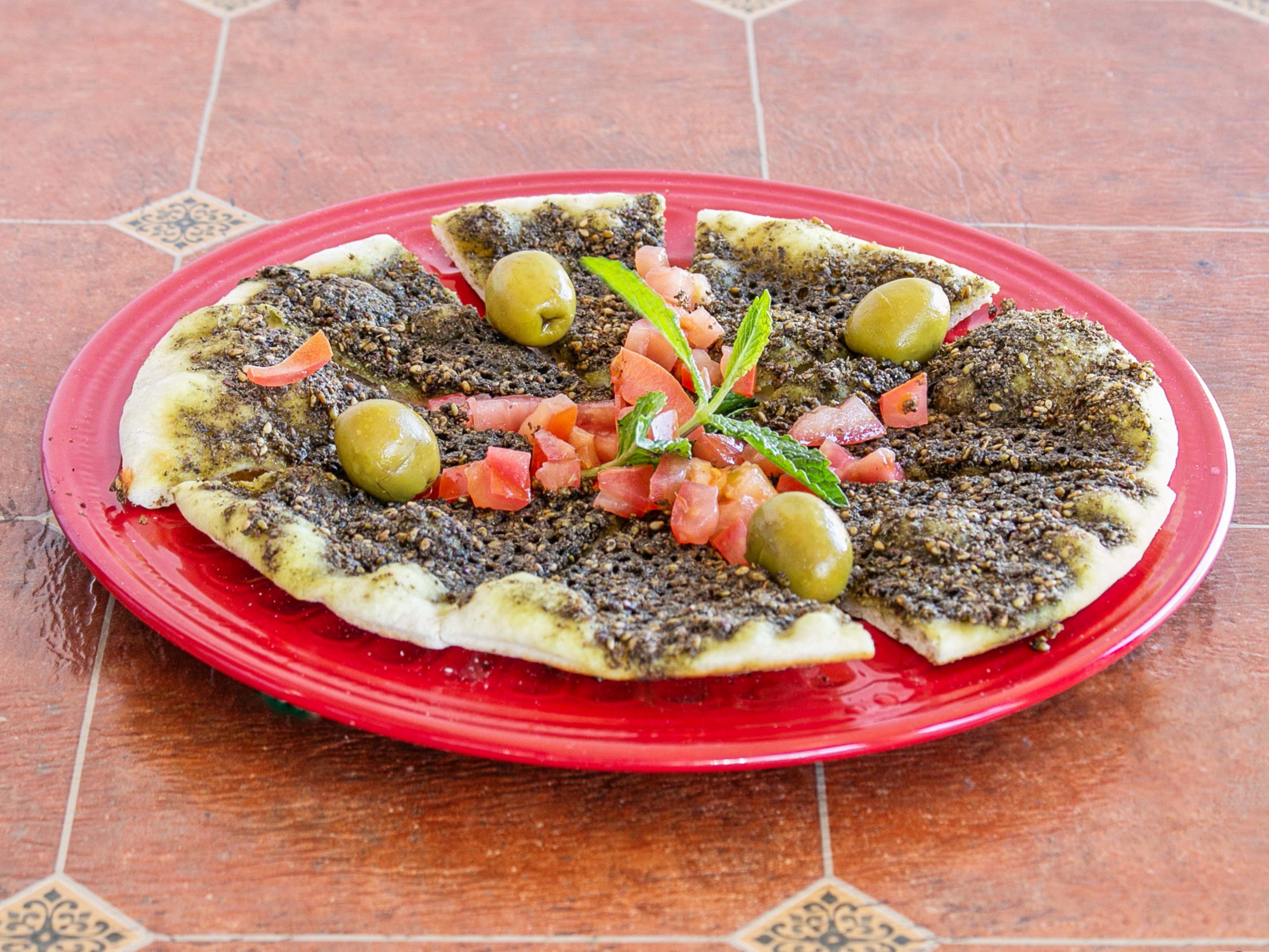Order Zaatar Manouchemail food online from The Lebanese Oven store, Ventura on bringmethat.com