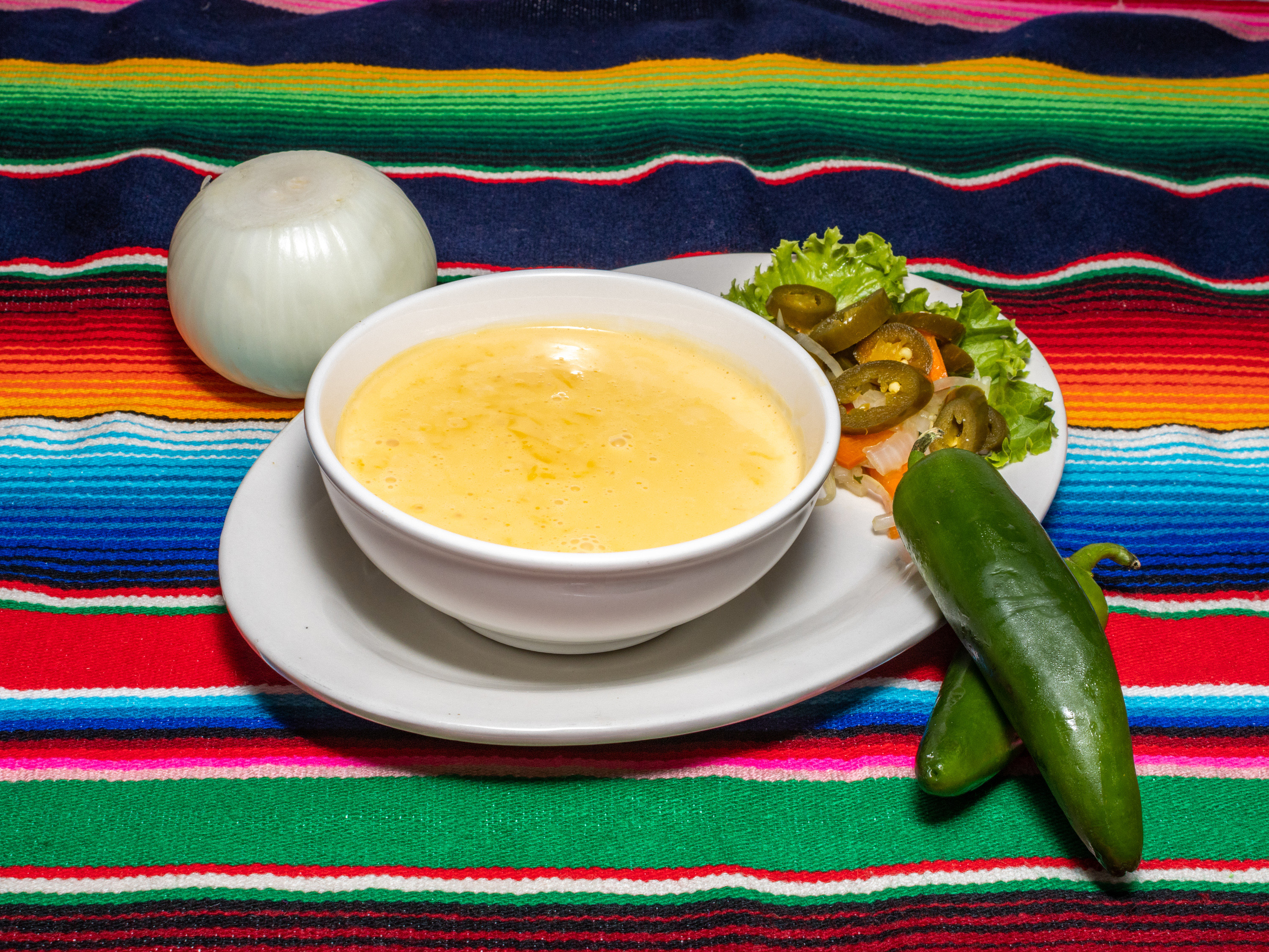 Order Chile con Queso food online from La Casa Agave Mexican Grill store, Pinehurst on bringmethat.com