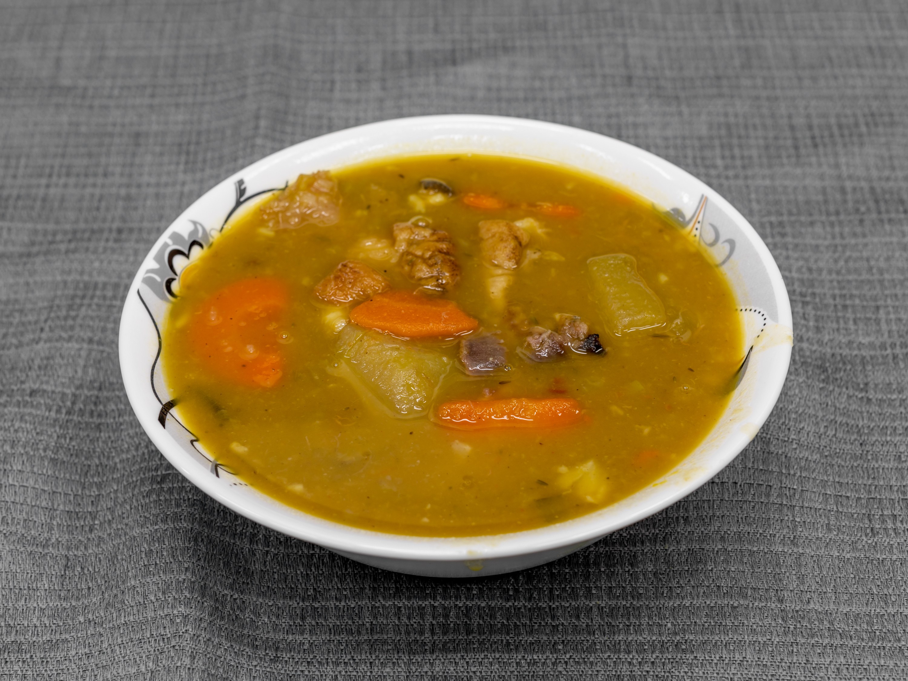 Order Friday Goat Head Soup food online from Caggy Hotspot Restaurant store, Yonkers on bringmethat.com