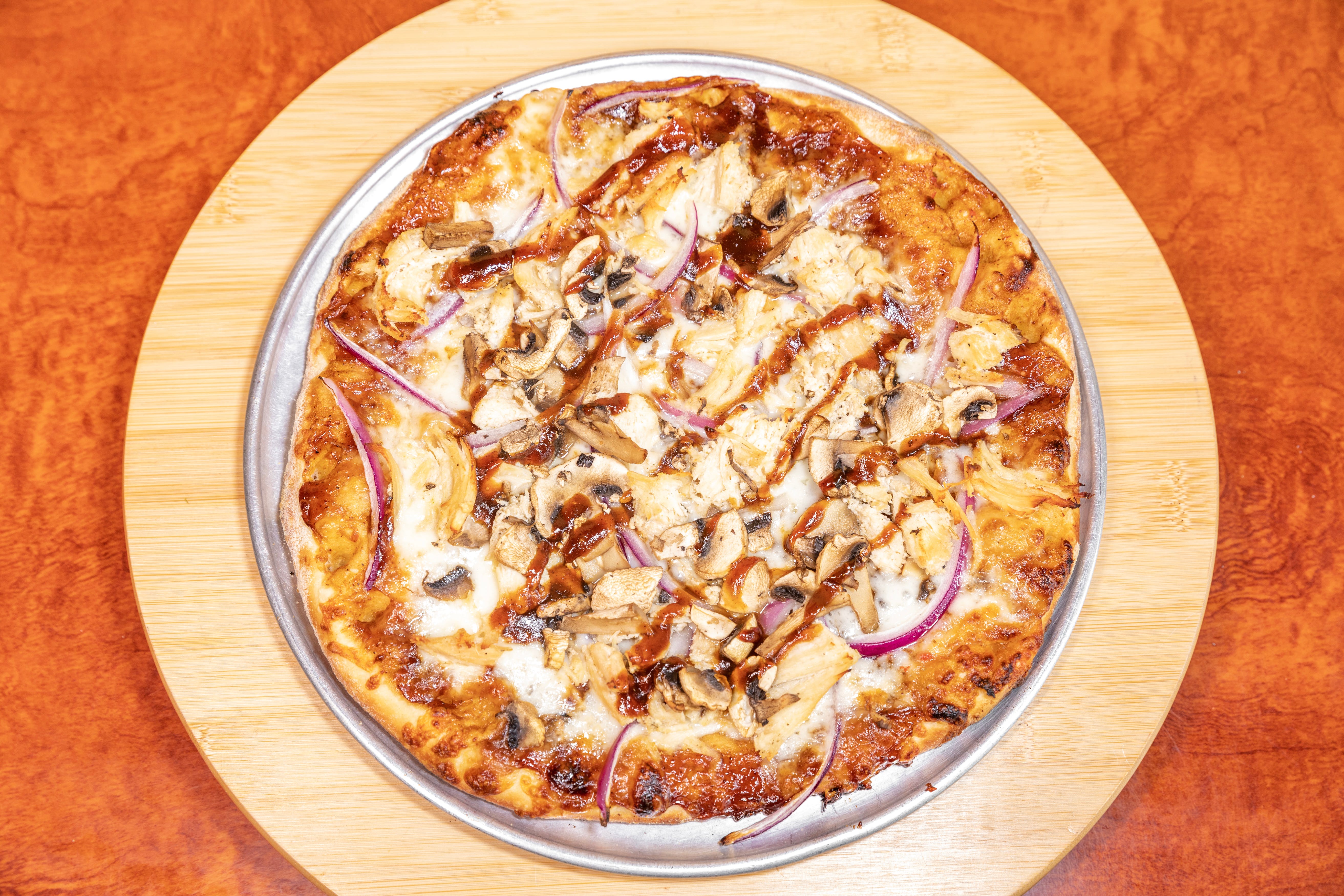 Order BBQ Chicken Pizza - Personal 10" (4 Slices) food online from Empanada Man Pizzeria store, Lake Forest on bringmethat.com