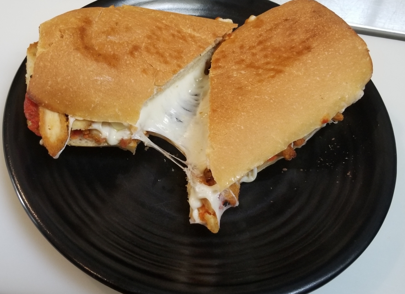 Order Chicken Parmesan Sandwich food online from Hayes Pizza store, San Francisco on bringmethat.com