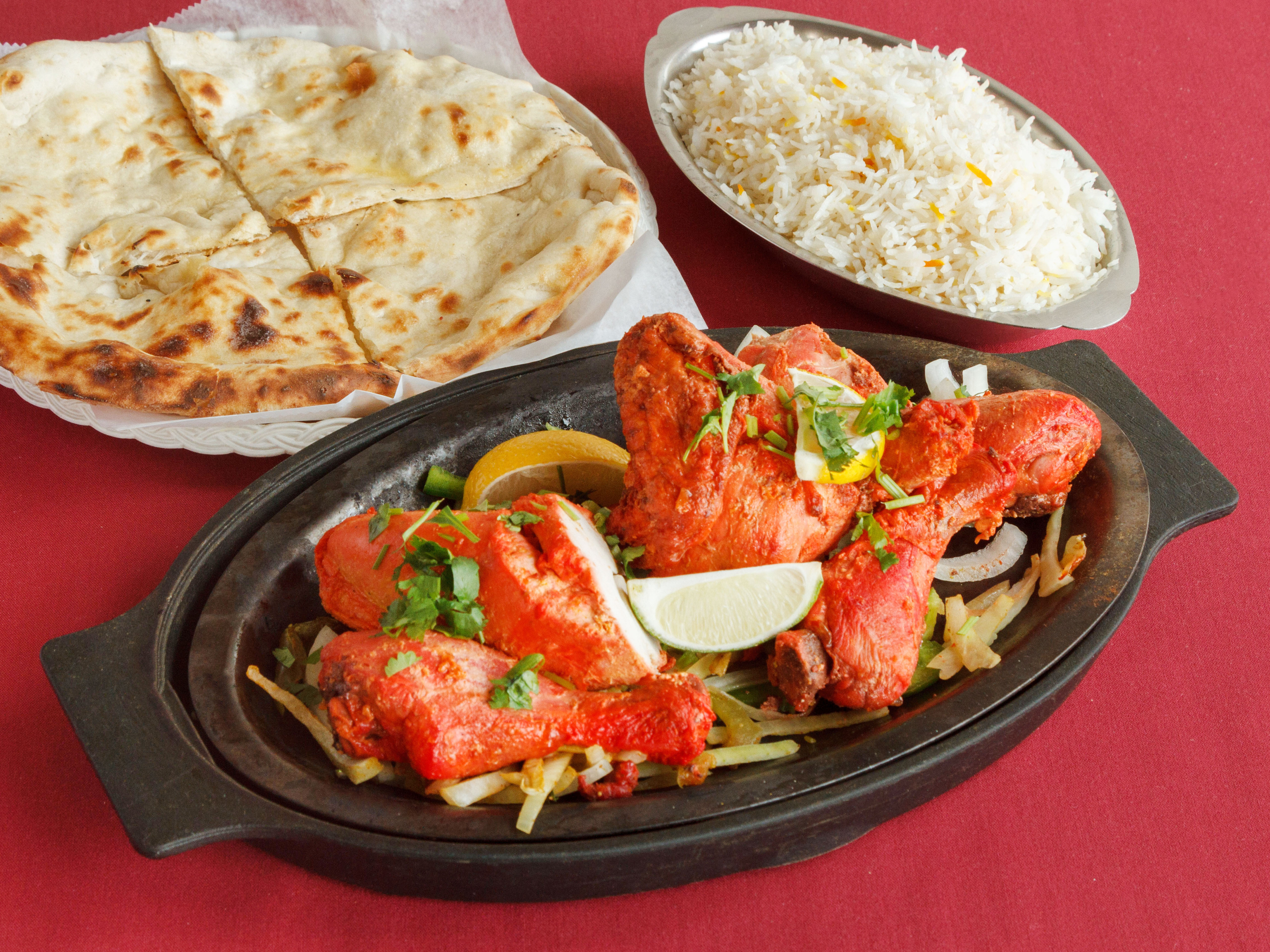 Order Whole Tandoori Chicken food online from Joti Palace store, Malden on bringmethat.com
