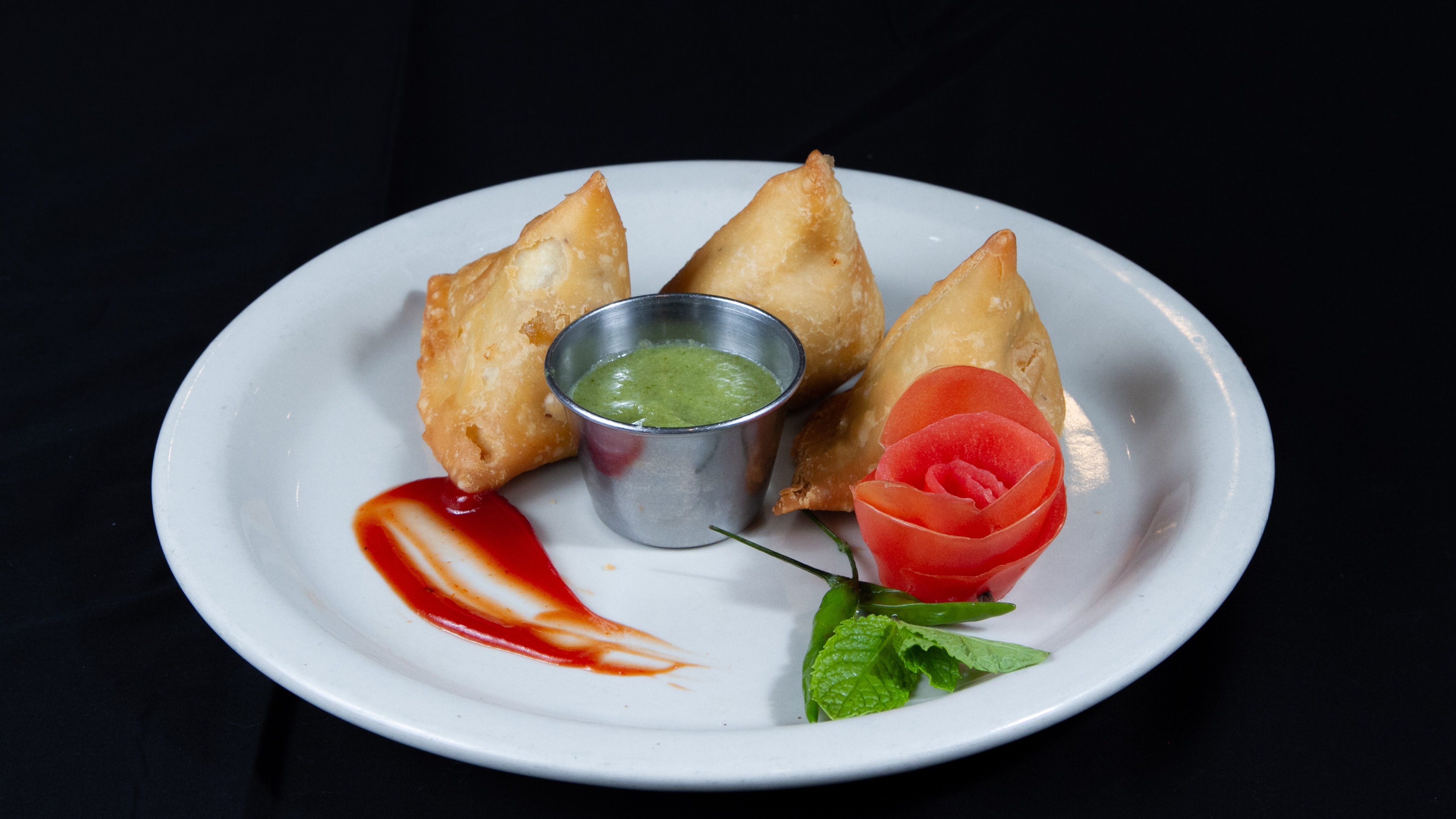 Order Samosa - 3 Pieces food online from Sangam Chettinad Indian Cuisine store, Austin on bringmethat.com