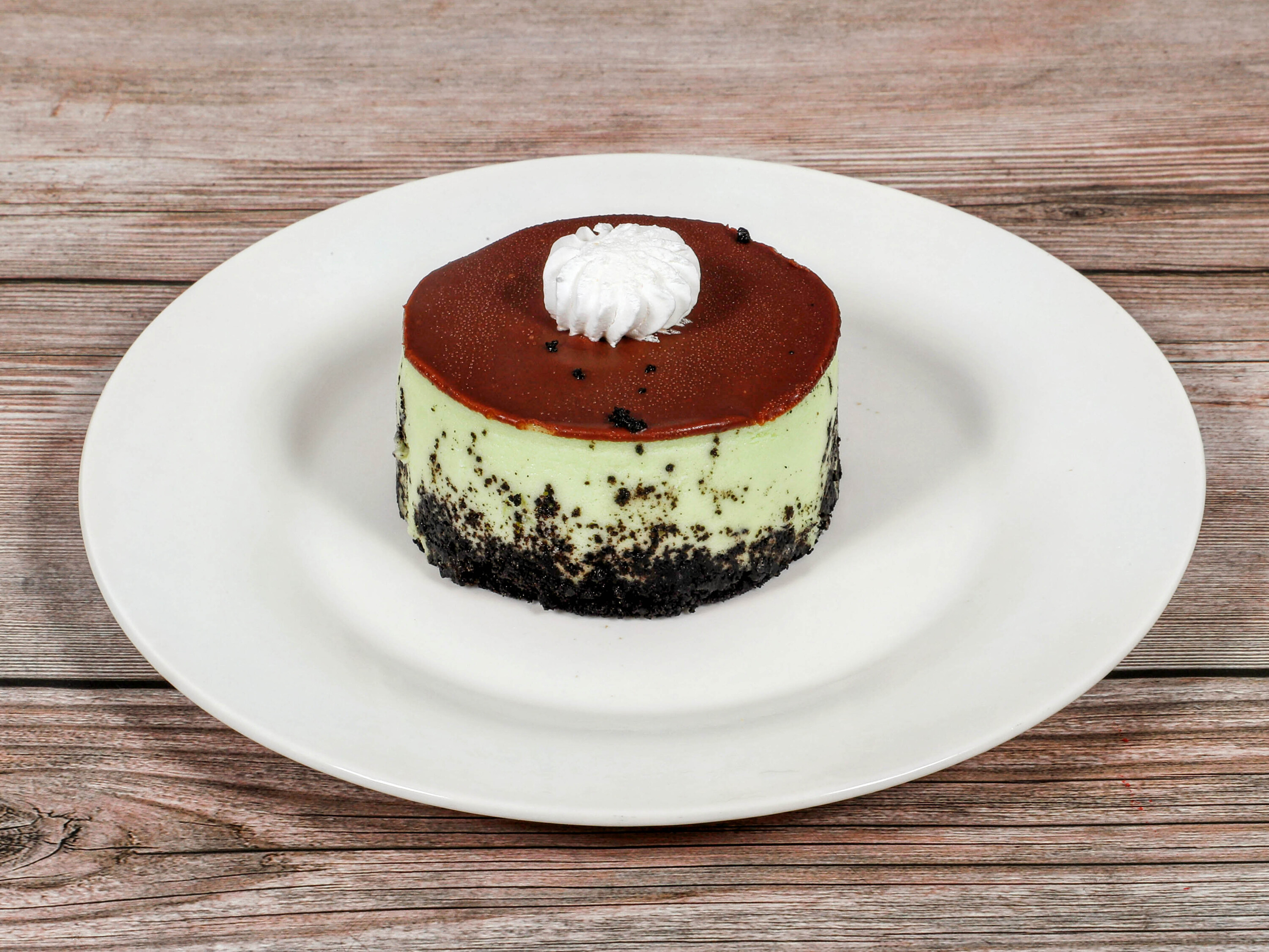 Order Green Grasshopper Cheesecake  food online from Tastee Grill store, San Mateo on bringmethat.com