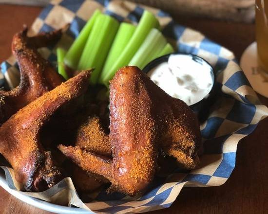 Order Smoked Chicken Wings food online from Blue Tractor Barbeque store, Traverse City on bringmethat.com