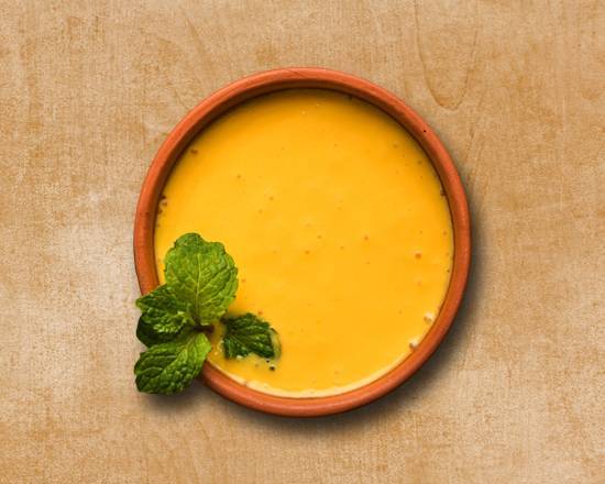 Order Flavored Mango Lassi food online from Curry Spoon store, Suwanee on bringmethat.com
