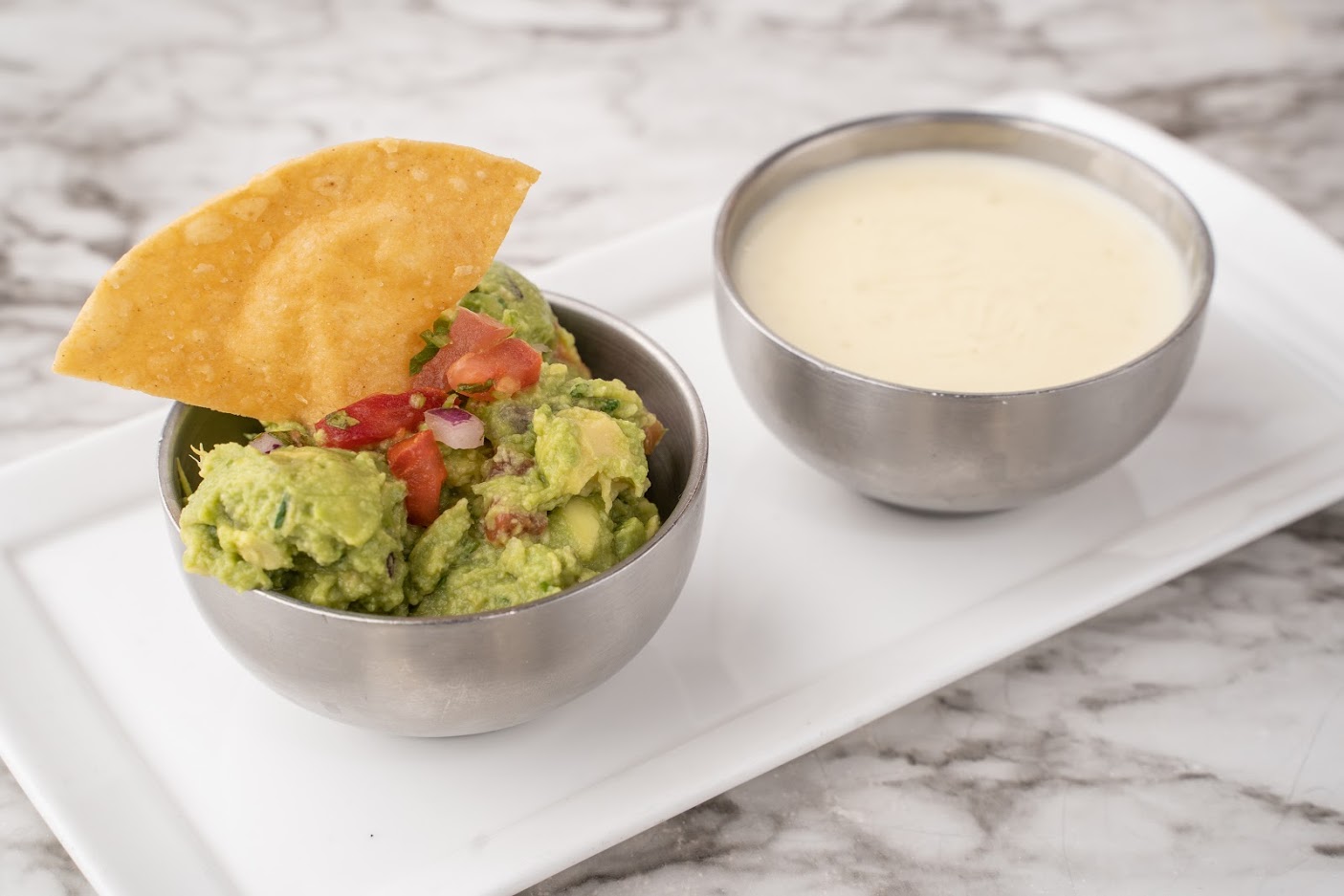 Order Queso Dip food online from Zocalo Street Food | Tequila store, Wilmington on bringmethat.com