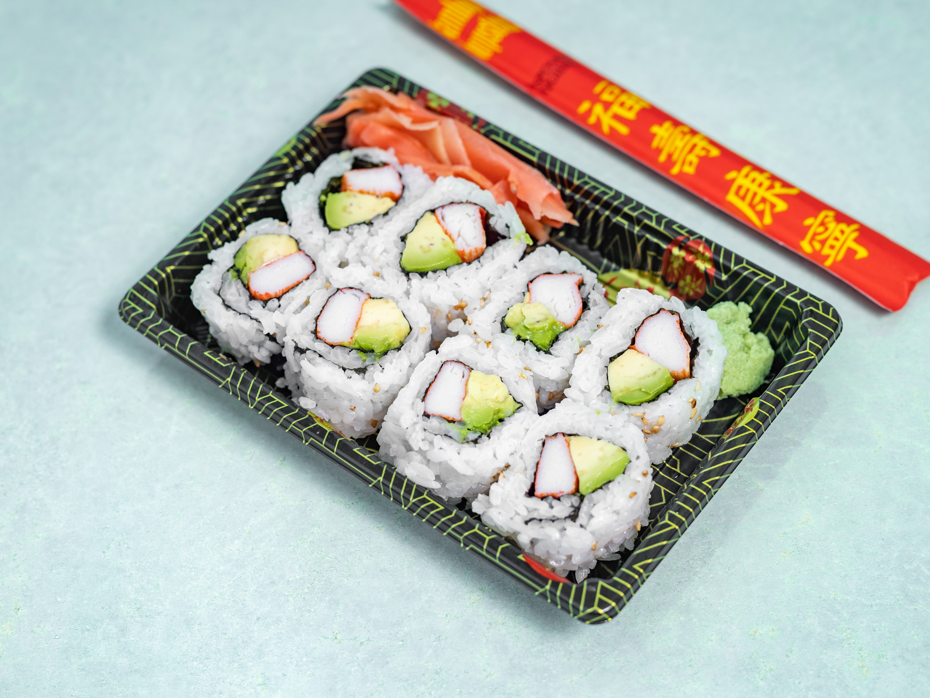 Order California Roll 8 Pieces Avocado & Crabstick Sushi  food online from New Japan Express store, Garner on bringmethat.com