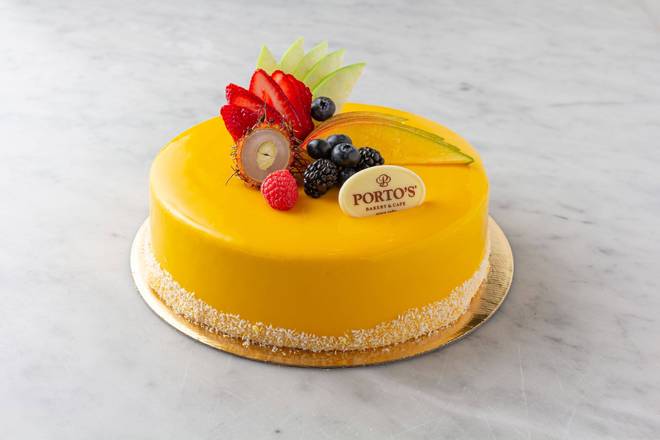 Order Mango Mousse Round food online from Porto Bakery & Cafe store, Buena Park on bringmethat.com