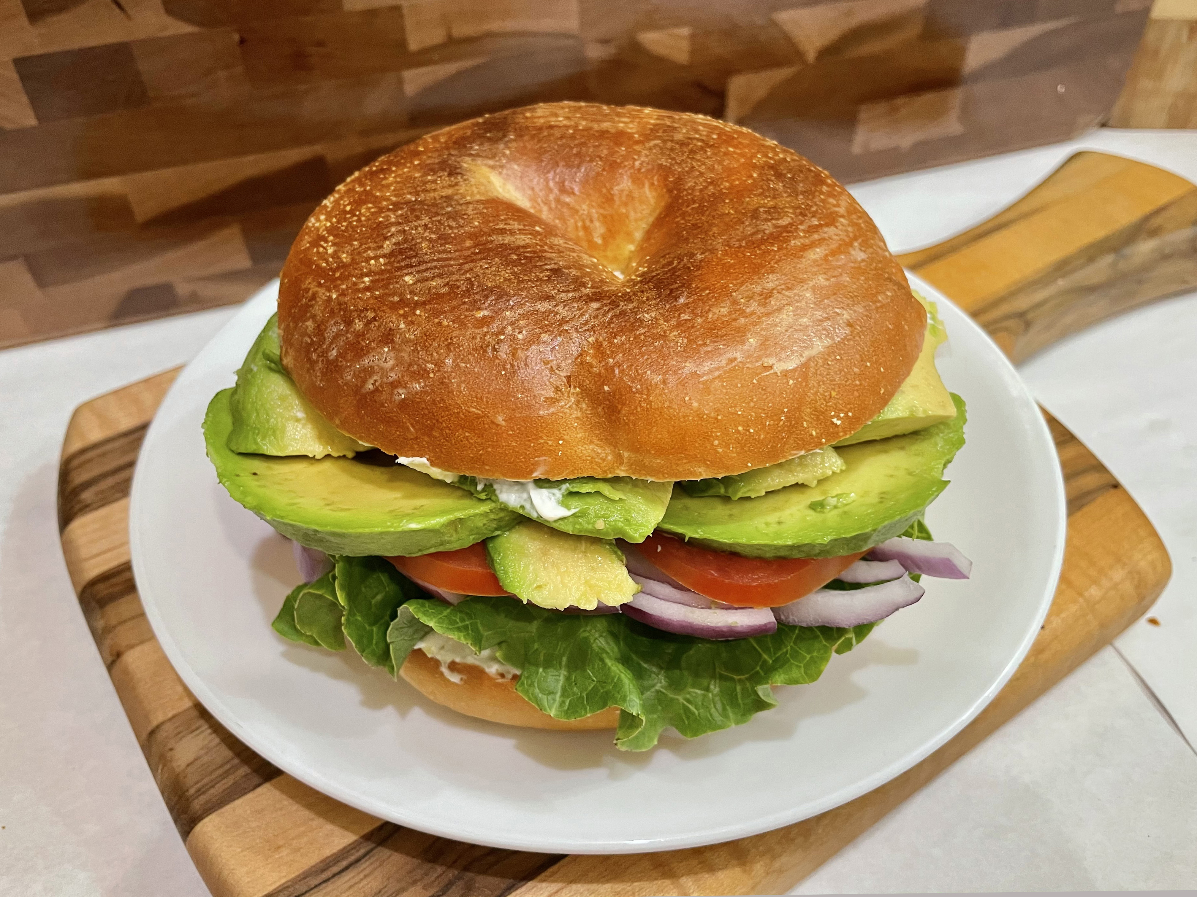 Order Bagel with Cream Cheese, Lettuce, Tomato, Onion and Avocado Sandwich food online from Glaze Donuts And Bagel Sandwiches store, San Francisco on bringmethat.com