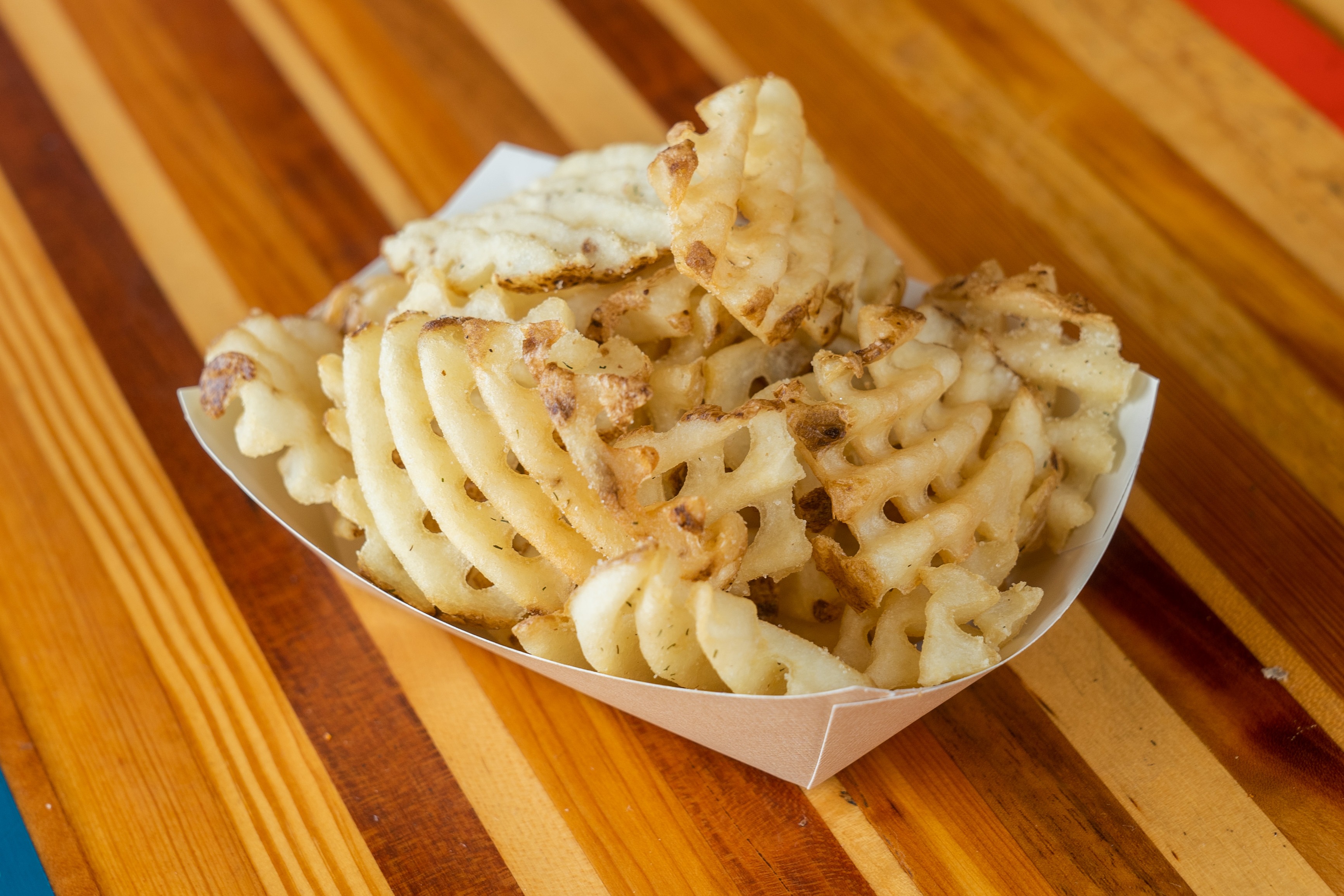 Order Waffle Fries food online from M.L.Rose Craft Beer & Burgers store, Nashville on bringmethat.com